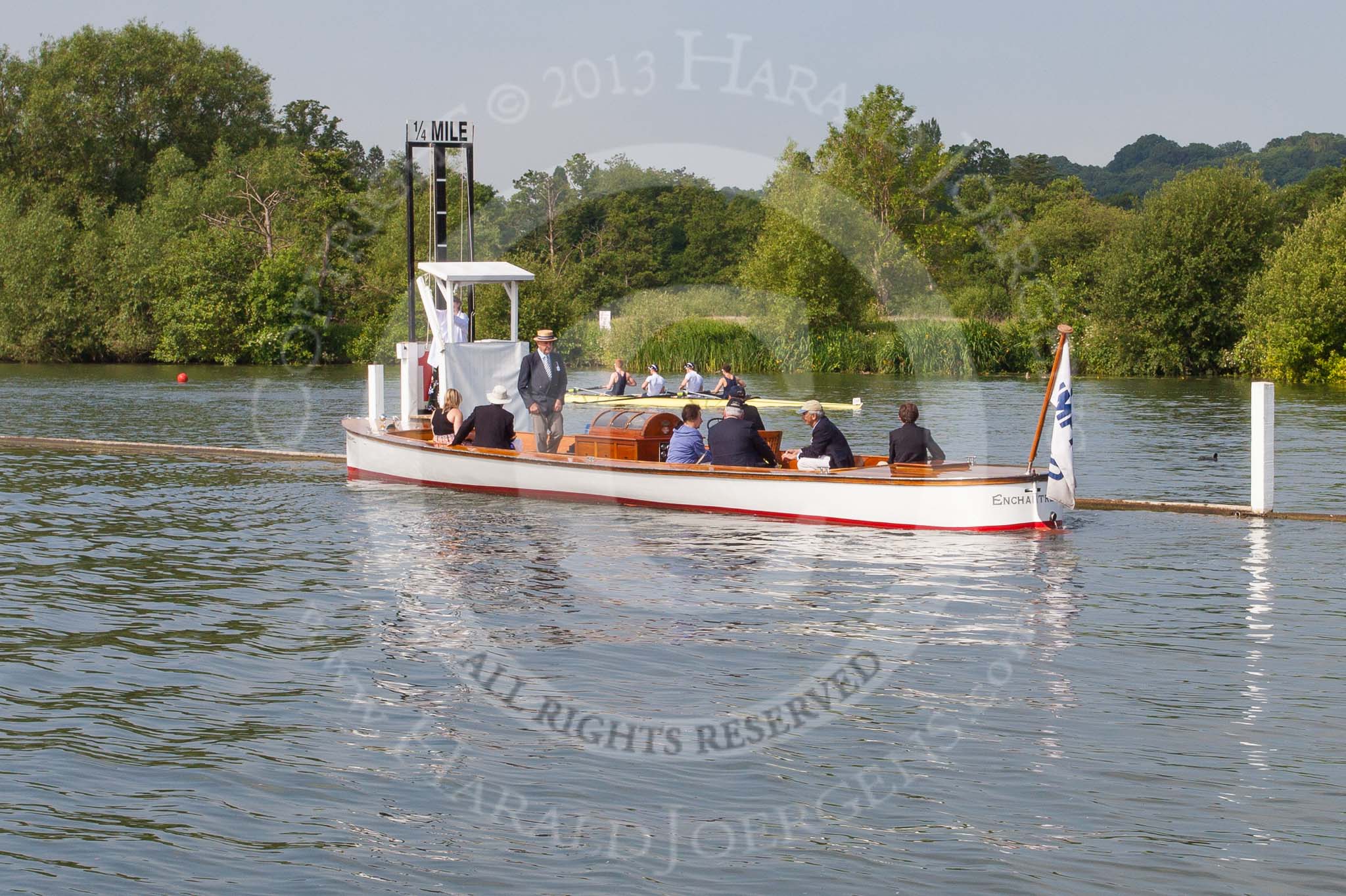 Henley Royal Regatta 2013, Saturday: Minutes before the Saturday races begin - a race official is dropped at the 1/4 mile marker. Image #60, 06 July 2013 09:44 River Thames, Henley on Thames, UK