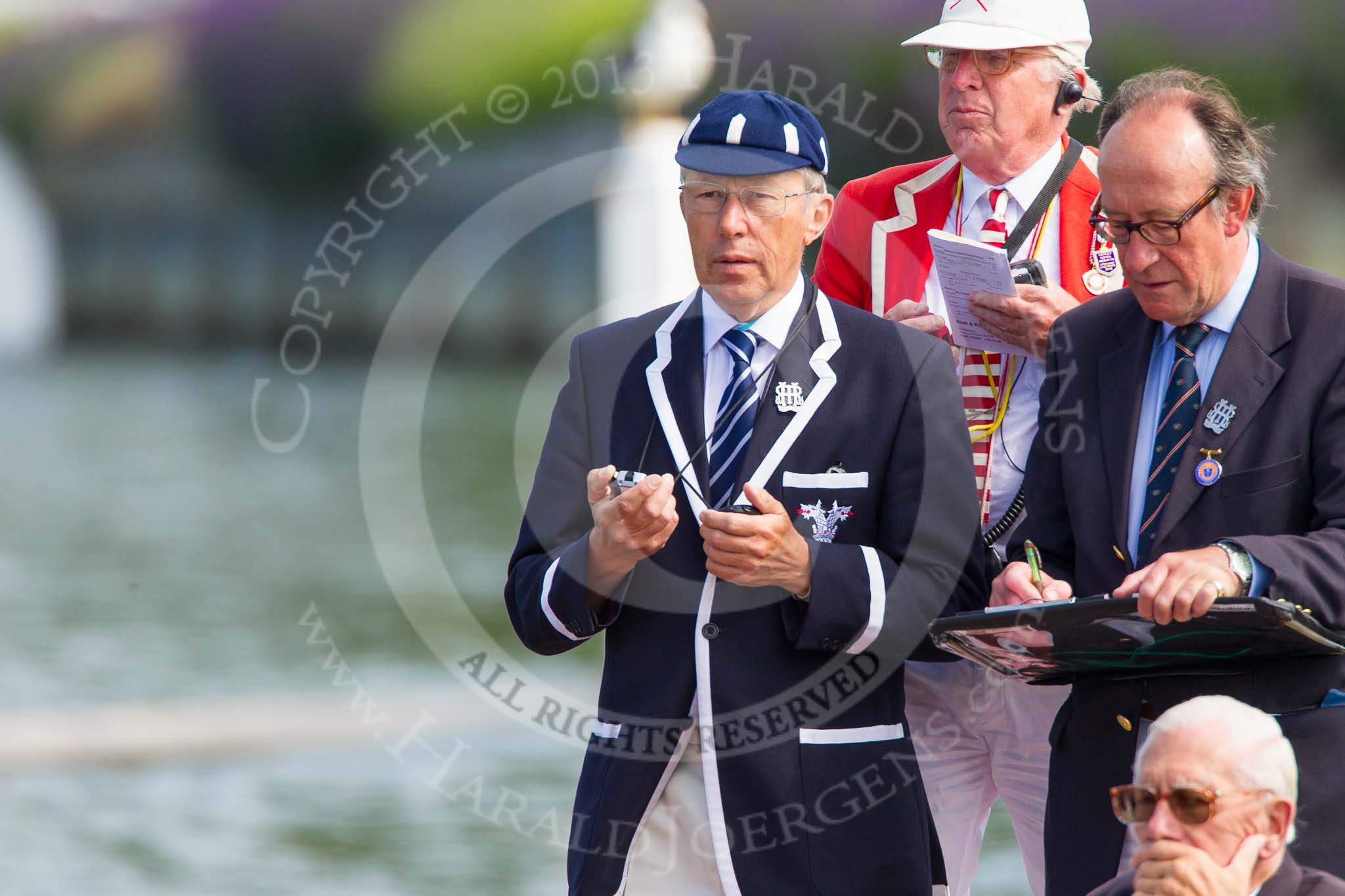 Henley Royal Regatta 2013, Saturday: Race judges standing in the umpire's launch that follows the competitors. Image #101, 06 July 2013 10:11 River Thames, Henley on Thames, UK