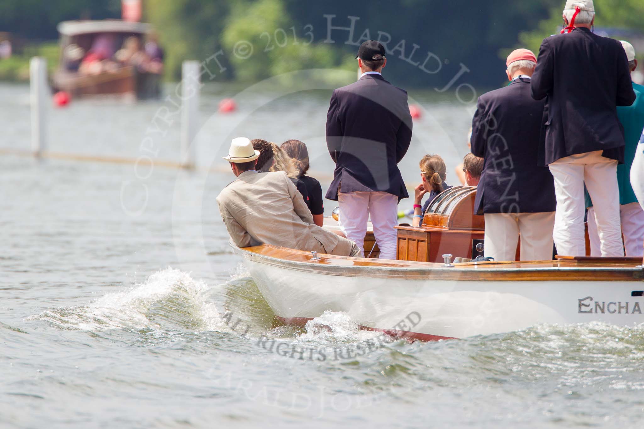 Henley Royal Regatta 2013, Saturday: Race No. 11 for the Princess Royal Challenge Cup, Victoria Thornley (Leander Club) v Emma Twigg (Waiariki Rowing Club, New Zealand), the umpire's launch following the boats. Image #231, 06 July 2013 11:41 River Thames, Henley on Thames, UK