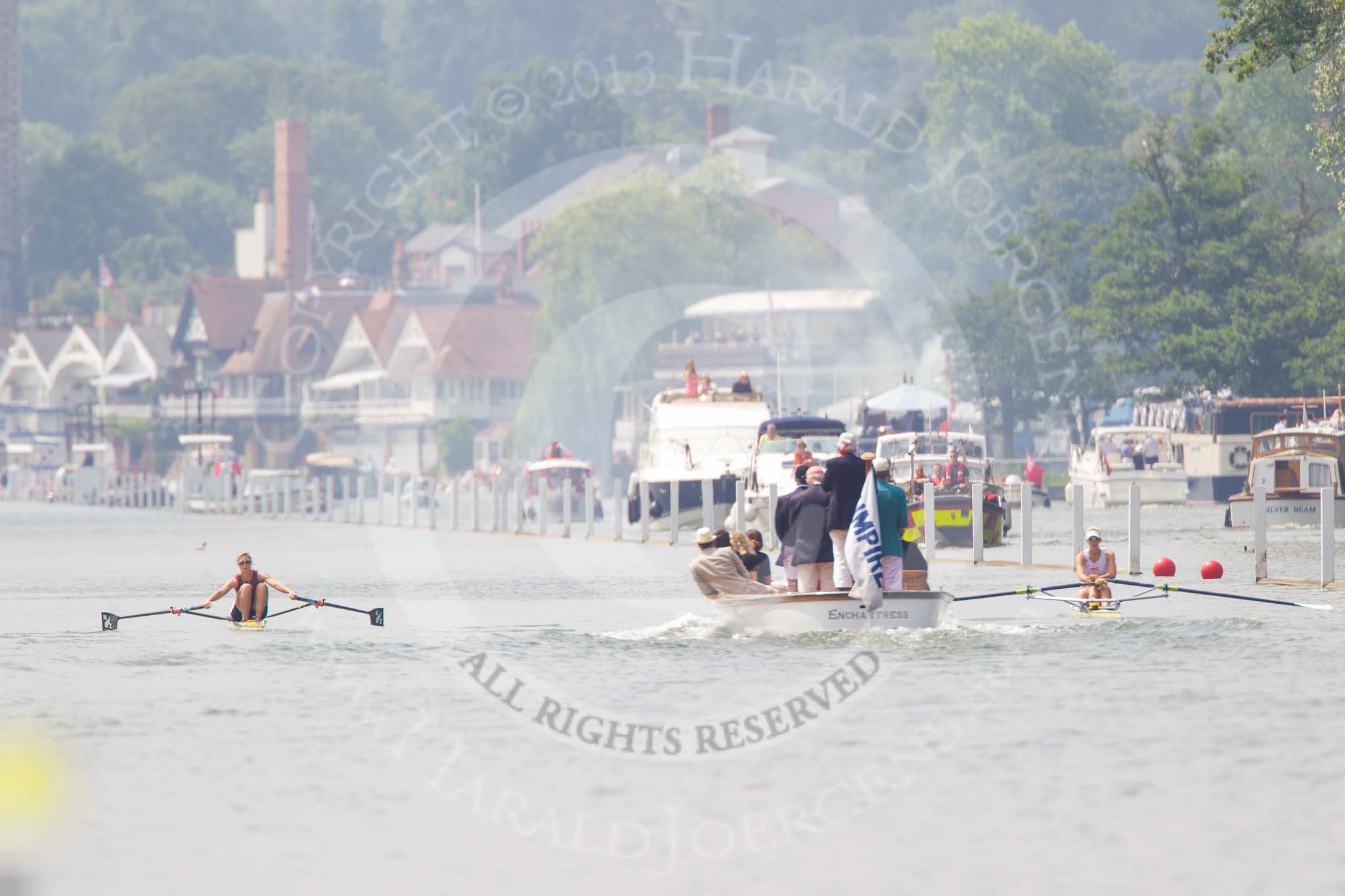 Henley Royal Regatta 2013, Saturday: Race No. 11 for the Princess Royal Challenge Cup, Victoria Thornley (Leander Club) v Emma Twigg (Waiariki Rowing Club, New Zealand), the umpire's launch following the boats, getting close to the 1-mile marker. Image #237, 06 July 2013 11:42 River Thames, Henley on Thames, UK