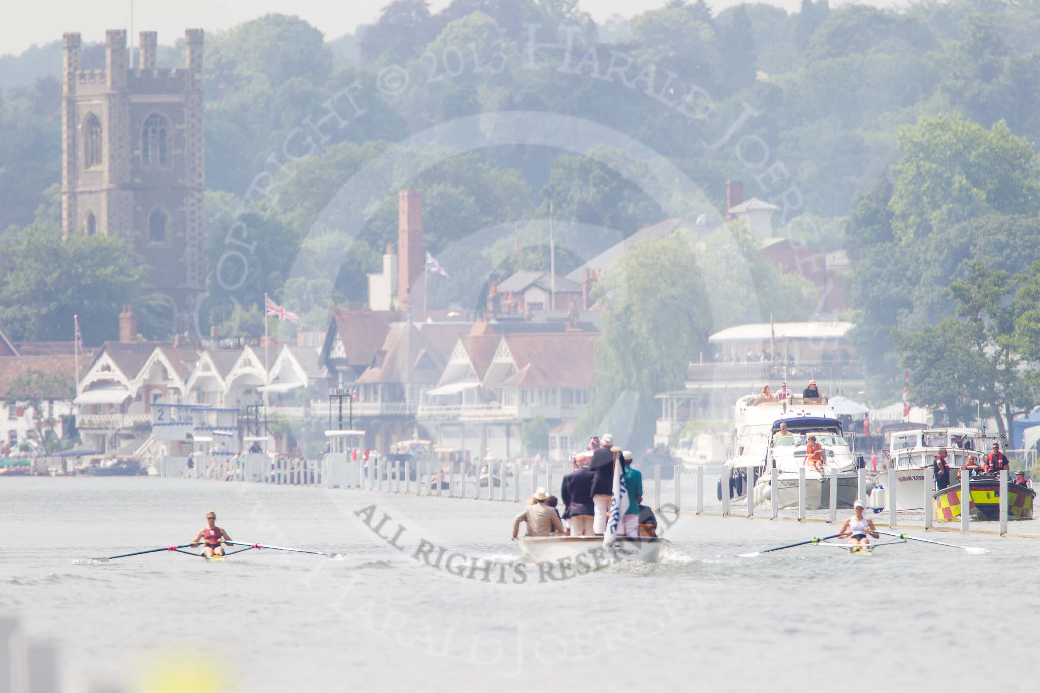 Henley Royal Regatta 2013, Saturday: Race No. 11 for the Princess Royal Challenge Cup, Victoria Thornley (Leander Club) v Emma Twigg (Waiariki Rowing Club, New Zealand), the umpire's launch following the boats, getting close to the 1-mile marker. Image #238, 06 July 2013 11:42 River Thames, Henley on Thames, UK