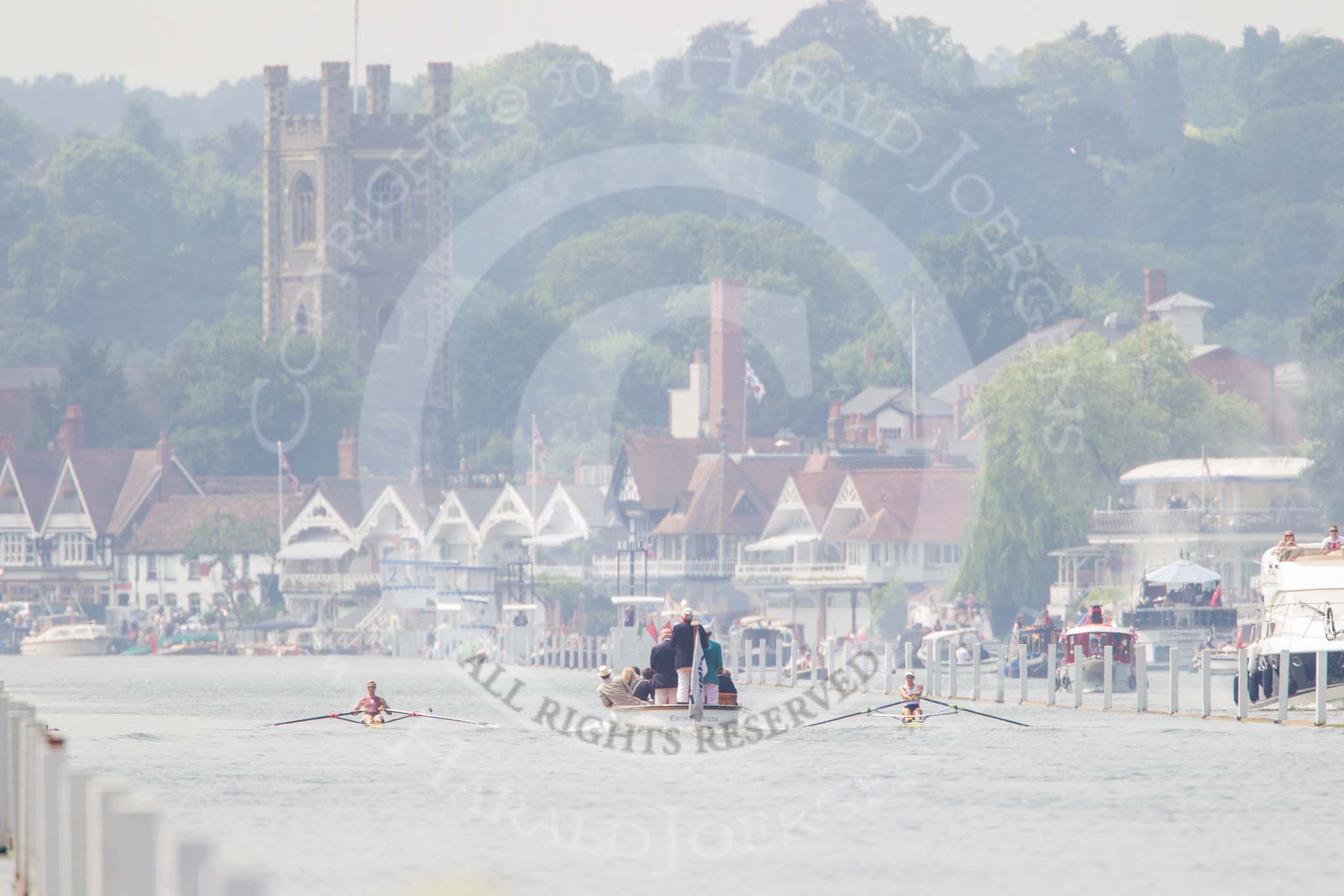 Henley Royal Regatta 2013, Saturday: Race No. 11 for the Princess Royal Challenge Cup, Victoria Thornley (Leander Club) v Emma Twigg (Waiariki Rowing Club, New Zealand), the umpire's launch following the boats, getting close to the 1-mile marker. Image #239, 06 July 2013 11:43 River Thames, Henley on Thames, UK