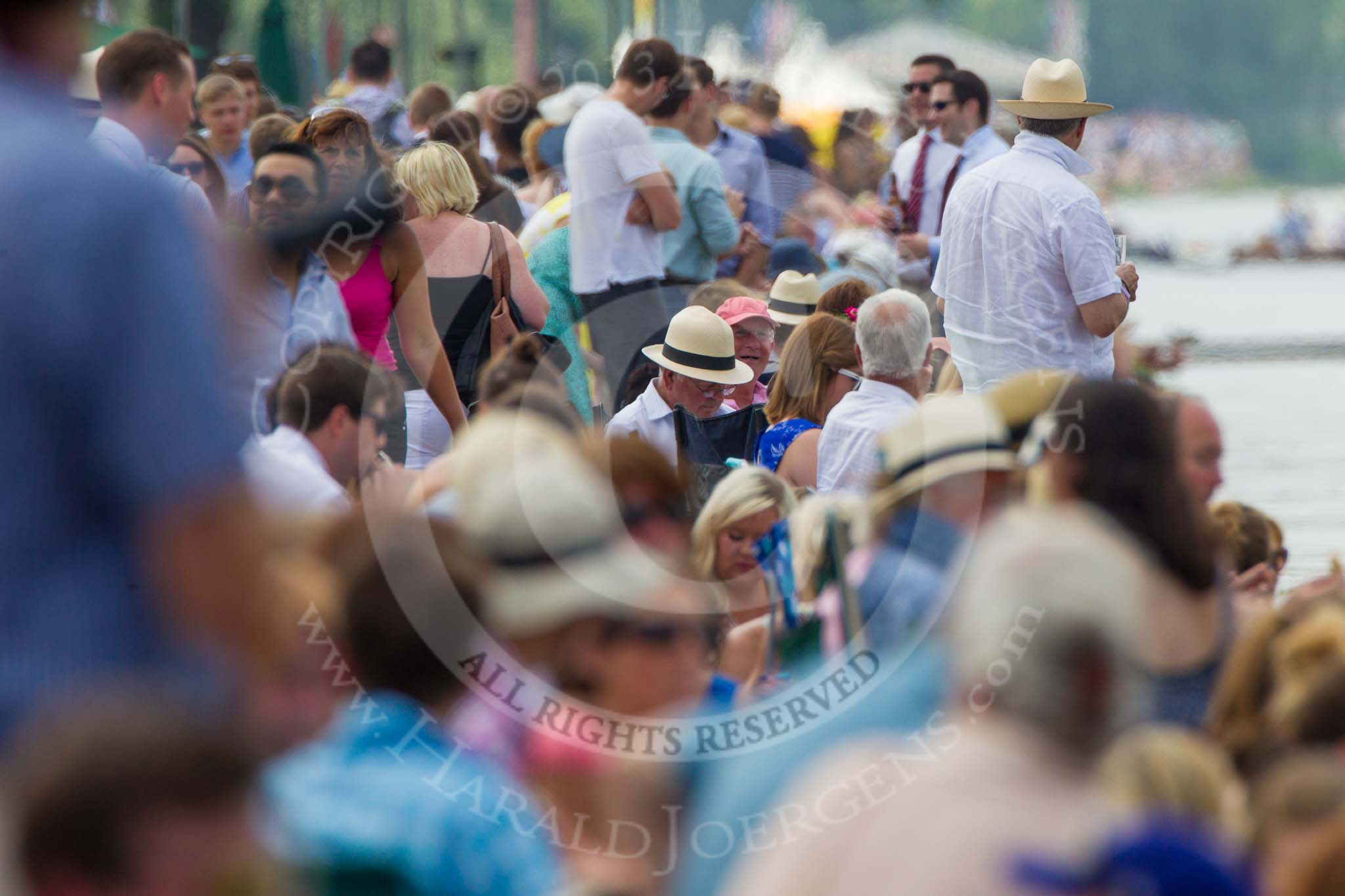 Henley Royal Regatta 2013, Saturday: Looking down towards the finish of the race course, the towpath is getting a bit crowded already. Image #288, 06 July 2013 12:17 River Thames, Henley on Thames, UK