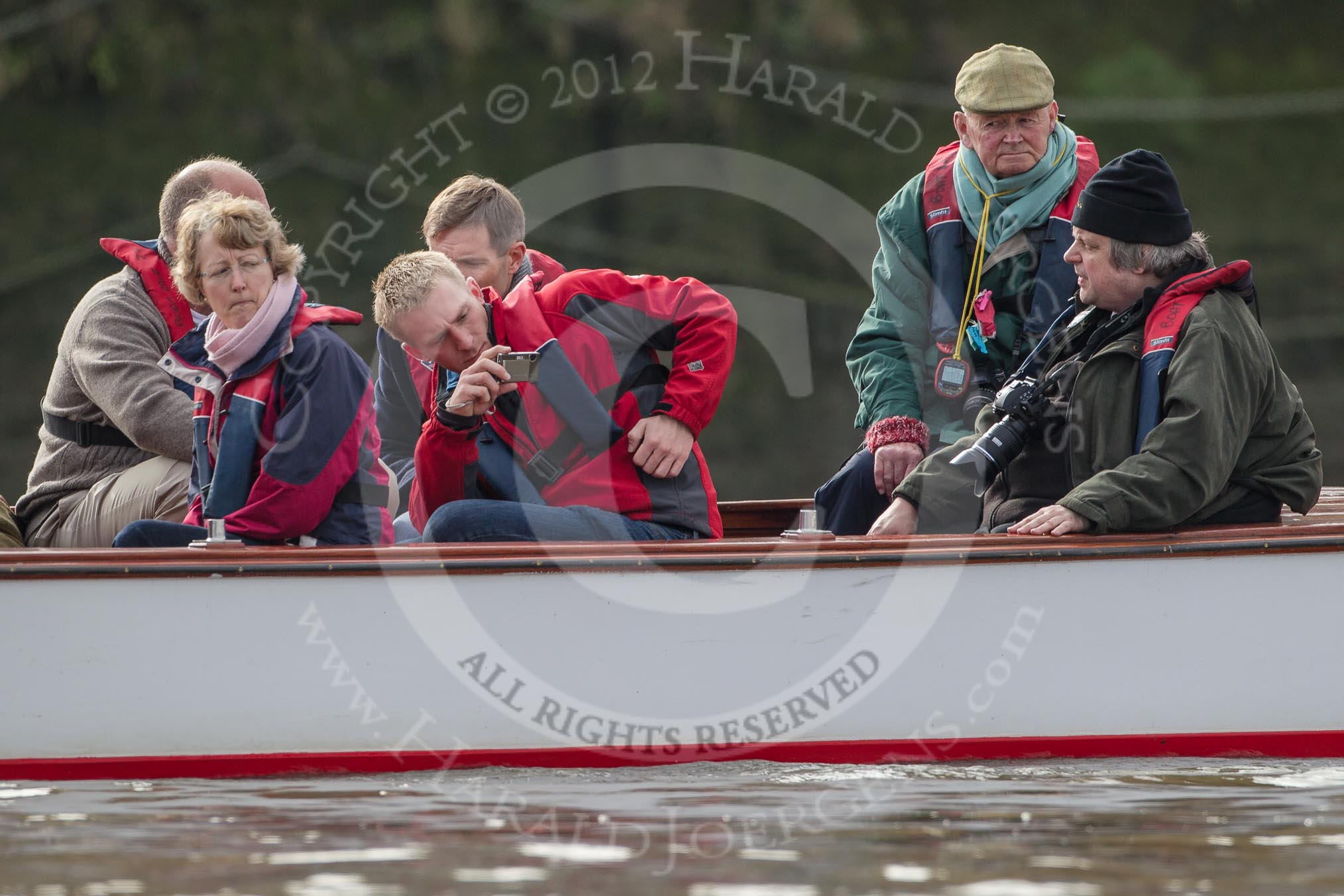 The Boat Race season 2012 - fixture CUBC vs Leander: Cambridge alumni watching the race..
River Thames between Putney and Molesey,
London,
Greater London,
United Kingdom,
on 10 March 2012 at 14:09, image #82