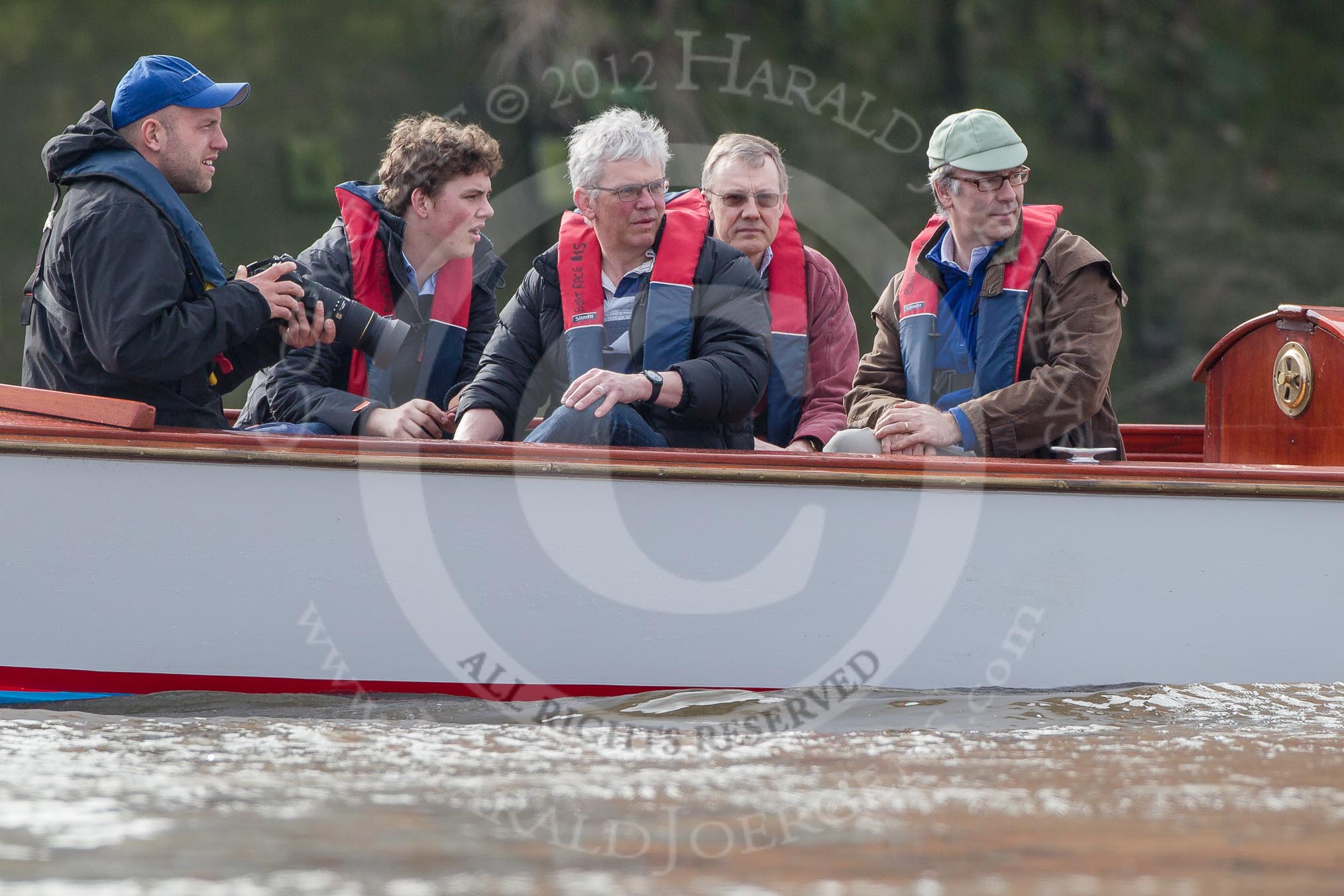 The Boat Race season 2012 - fixture CUBC vs Leander: Cambridge alumni watching the race..
River Thames between Putney and Molesey,
London,
Greater London,
United Kingdom,
on 10 March 2012 at 14:09, image #83