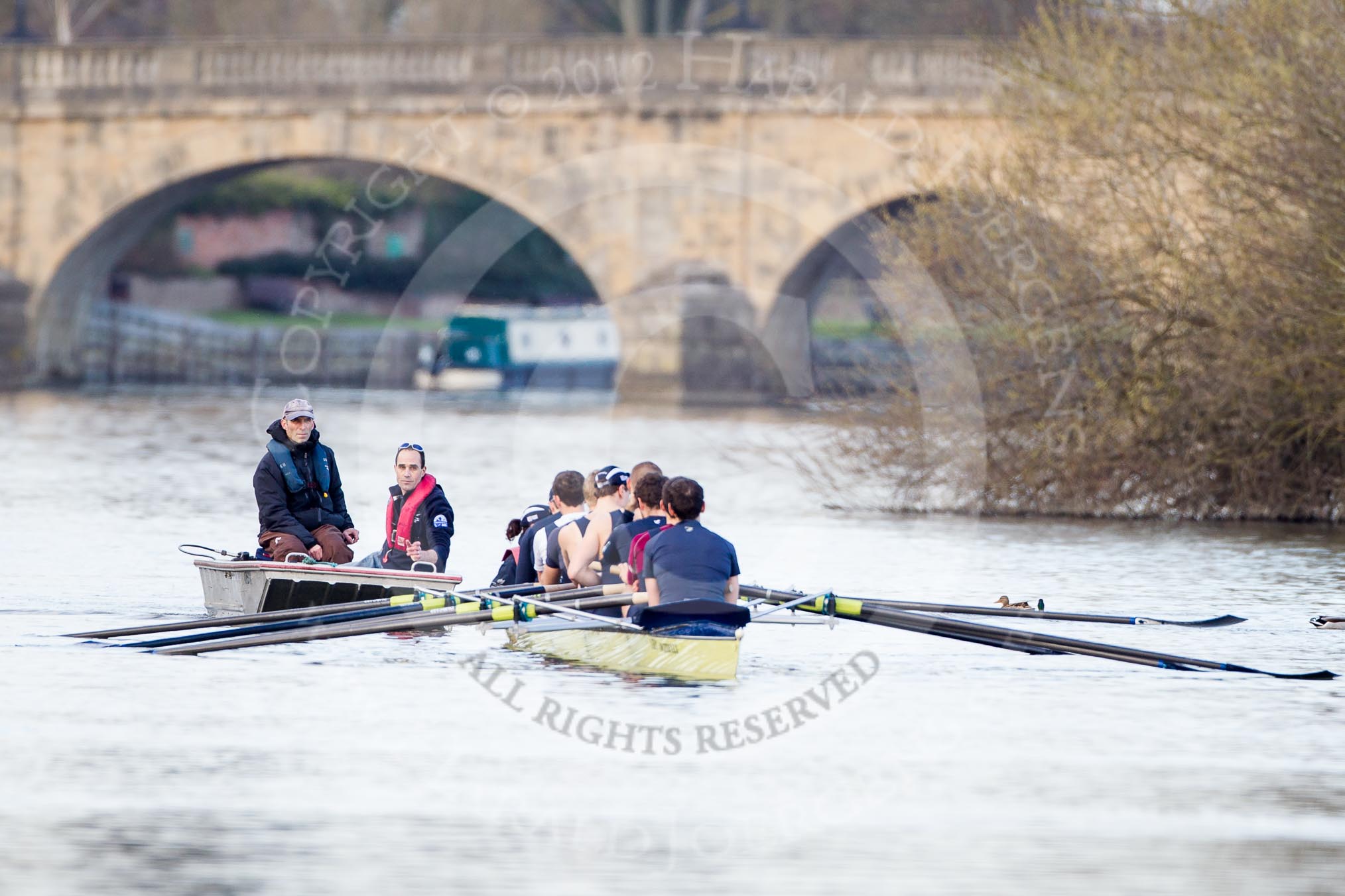 The Boat Race season 2012 - OUBC training: Oxford Chief Coach Sean Bowden, coach Filipe Salbany, and cox Zoe de Toledo, stroke Roel Haen, 7 Dan Harvey, 6 Dr. Hanno Wienhausen, 5 Karl Hudspith, 4 Alexander Davidson, 3 Kevin Baum, 2 William Zeng, bow Dr. Alexander Woods, in front of the historic Wallingford Bridge..


Oxfordshire,
United Kingdom,
on 20 March 2012 at 16:46, image #109