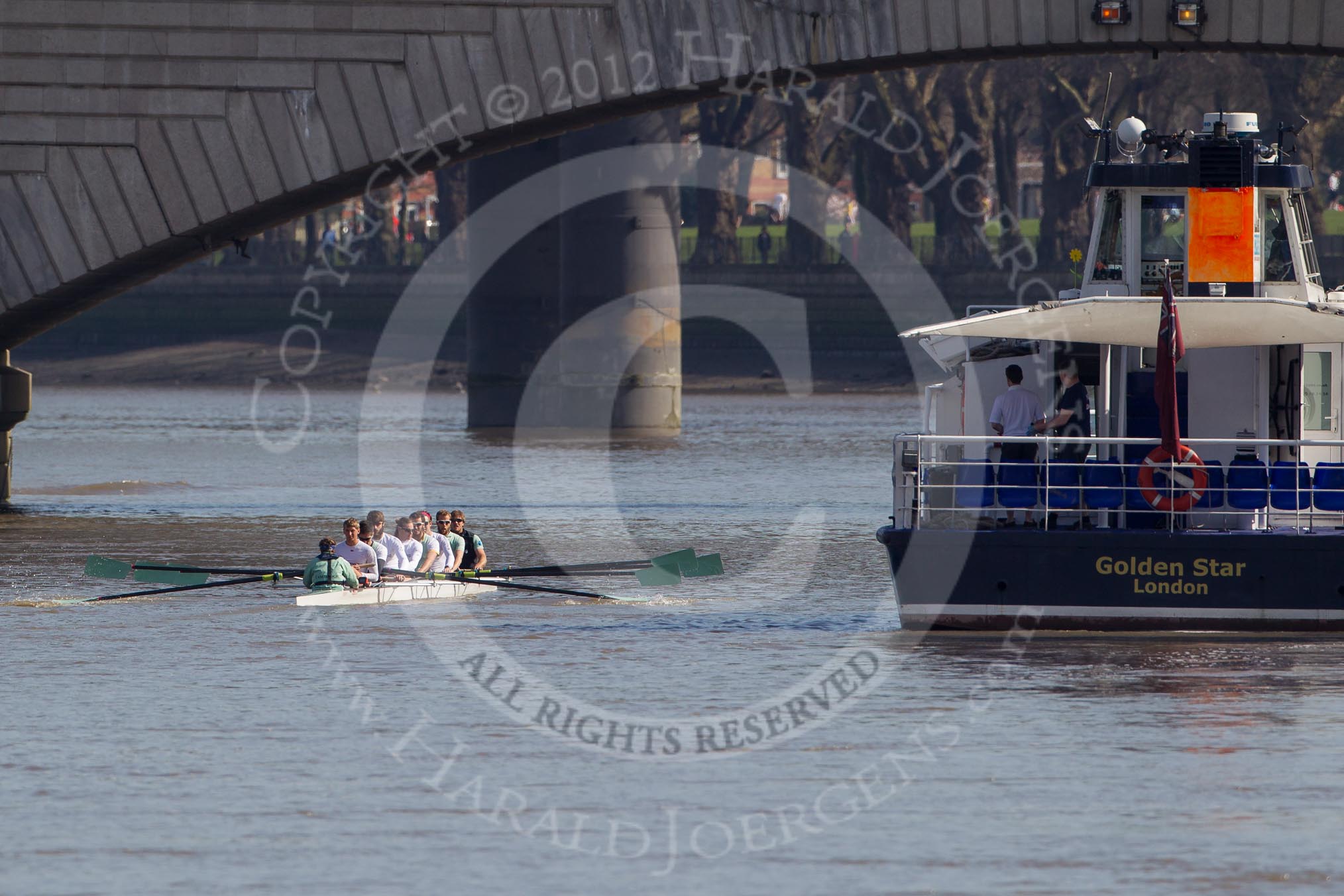 The Boat Race season 2012 - fixture CUBC vs Molesey BC: The CUBC Blue Boat getting ready to race Molesey BC - cox Ed Bosson, stroke Niles Garratt, Alexander Scharp, Steve Dudek, Mike Thorp, Alex Ross, Jack Lindeman, Moritz Schramm, and bow David Nelson below Putney Bridge..




on 25 March 2012 at 14:45, image #34