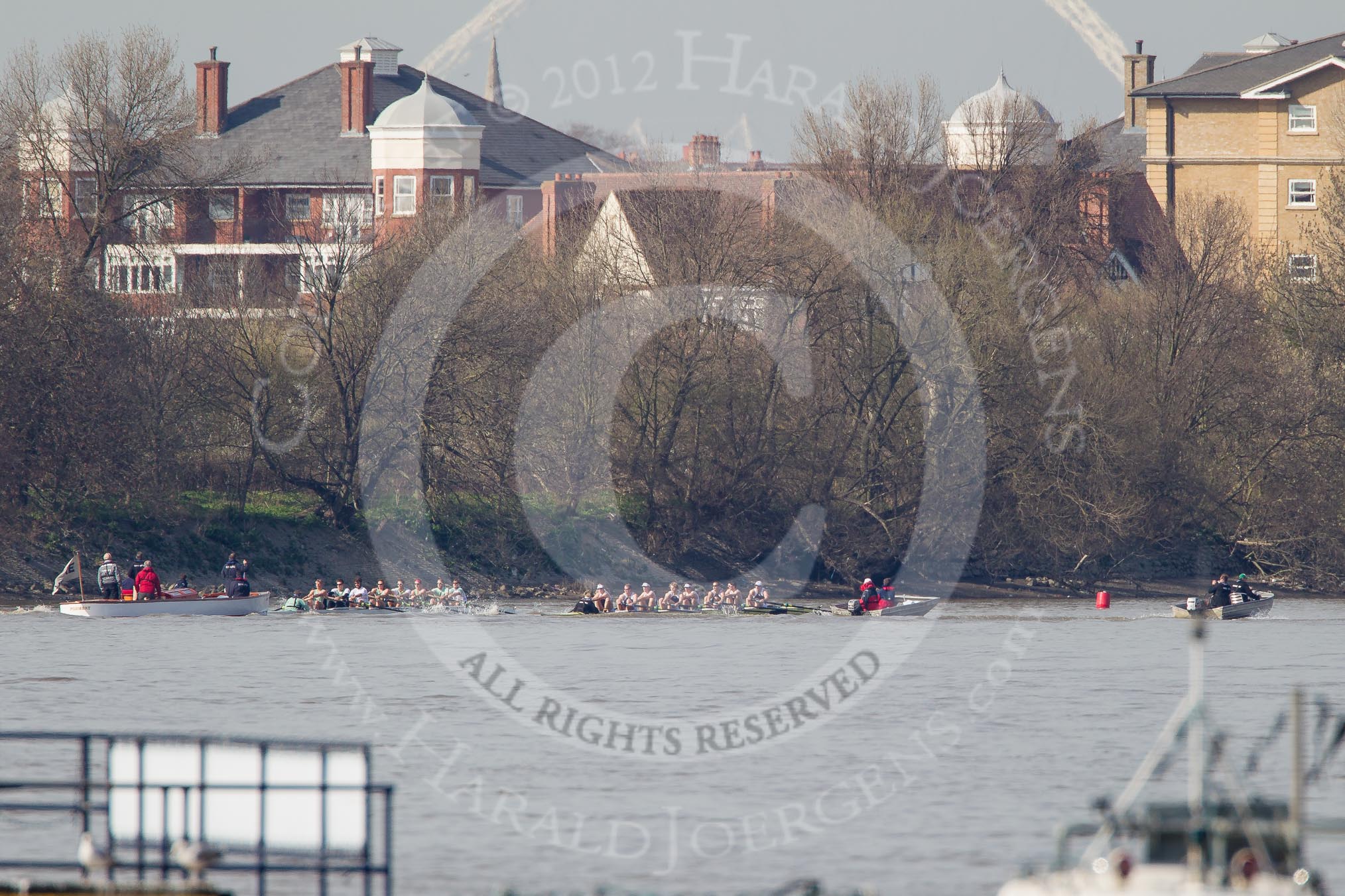 The Boat Race season 2012 - fixture CUBC vs Molesey BC: The CUBC Blue Boat on the left, the Molesey BC Eight on the right, behind them umpire Boris Rankov..




on 25 March 2012 at 15:21, image #144