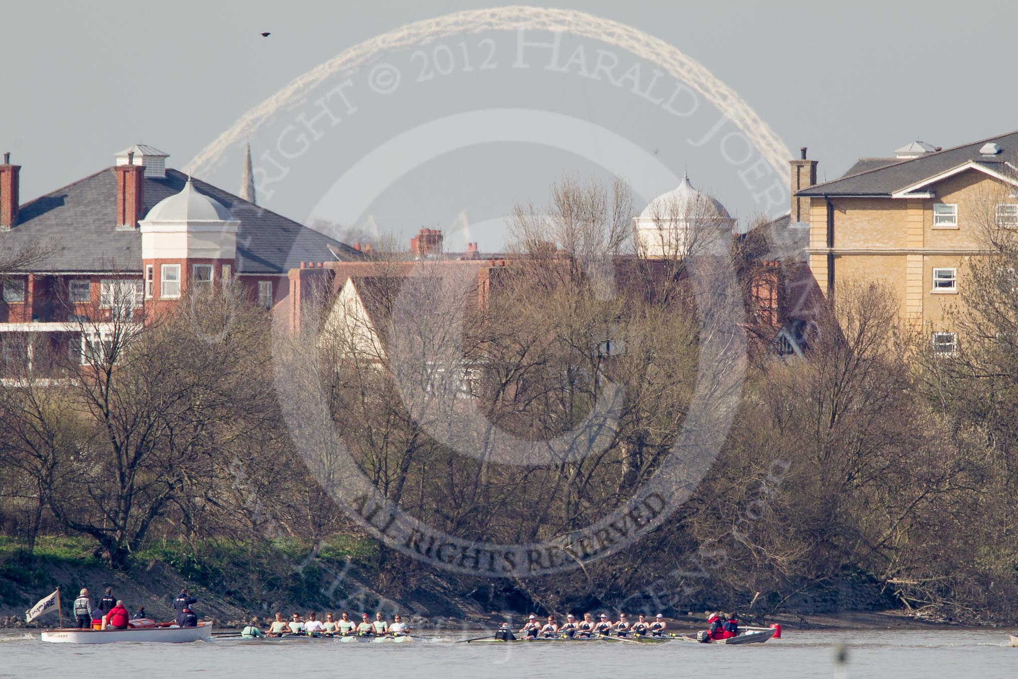 The Boat Race season 2012 - fixture CUBC vs Molesey BC: The CUBC Blue Boat on the left, the Molesey BC Eight on the right, behind them umpire Boris Rankov. In the background the arch of the new Wembley Stadium..




on 25 March 2012 at 15:21, image #145