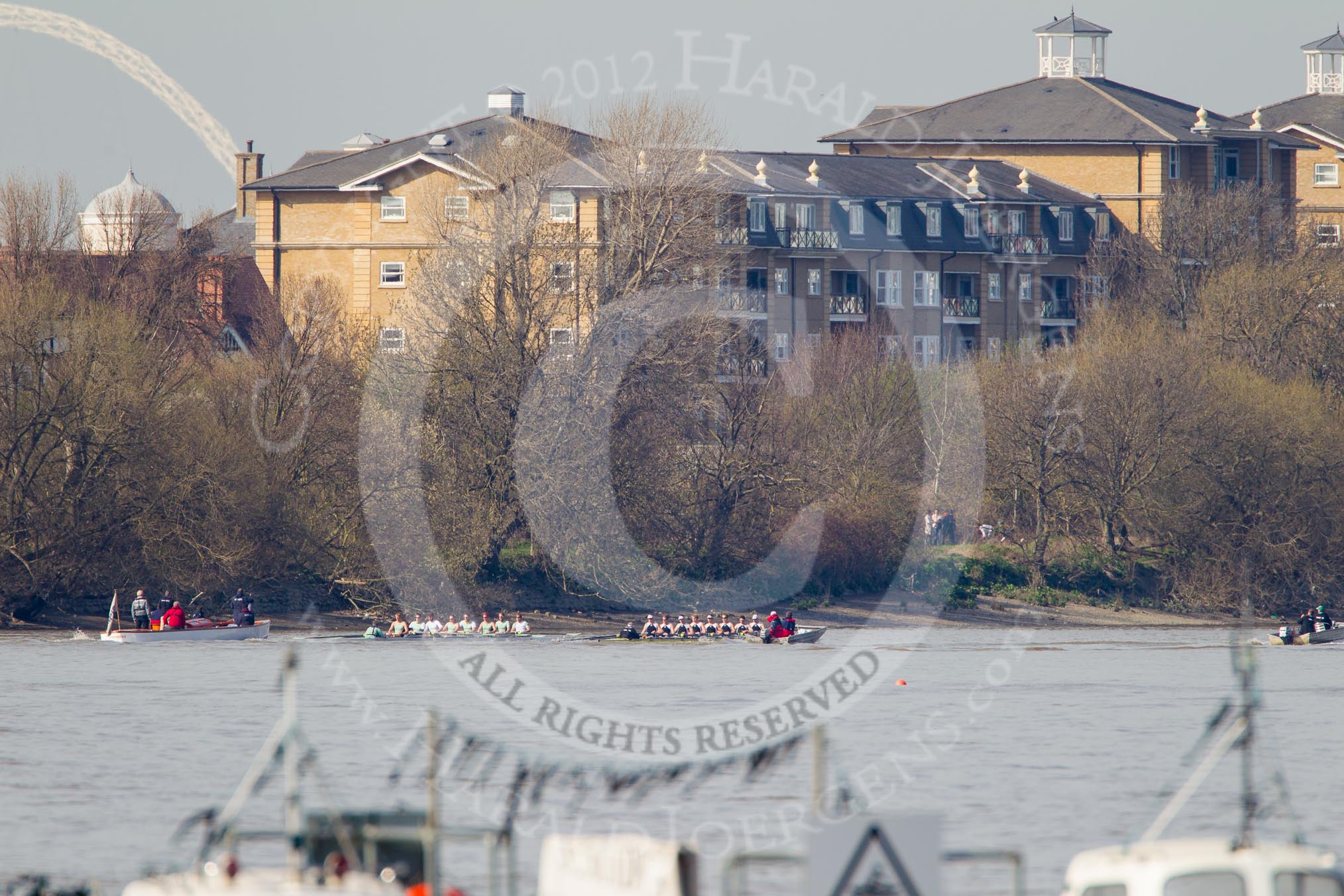 The Boat Race season 2012 - fixture CUBC vs Molesey BC: The CUBC Blue Boat on the left, the Molesey BC Eight on the right, behind them umpire Boris Rankov. In the background the arch of the new Wembley Stadium..




on 25 March 2012 at 15:22, image #146