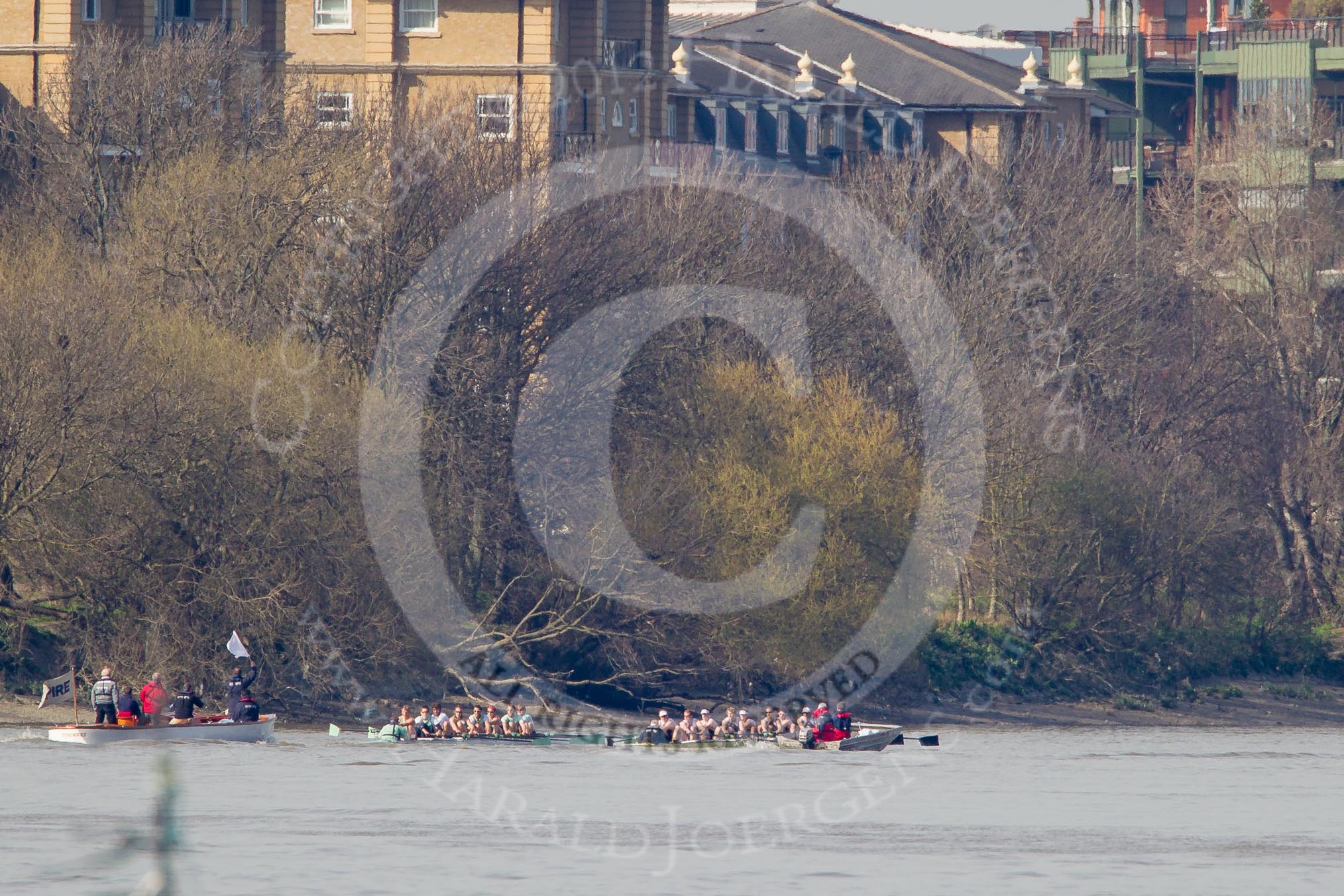 The Boat Race season 2012 - fixture CUBC vs Molesey BC: The CUBC Blue Boat on the left, the Molesey BC Eight on the right, behind them umpire Boris Rankov. The boats are approaching the Harrods Repository..




on 25 March 2012 at 15:22, image #147