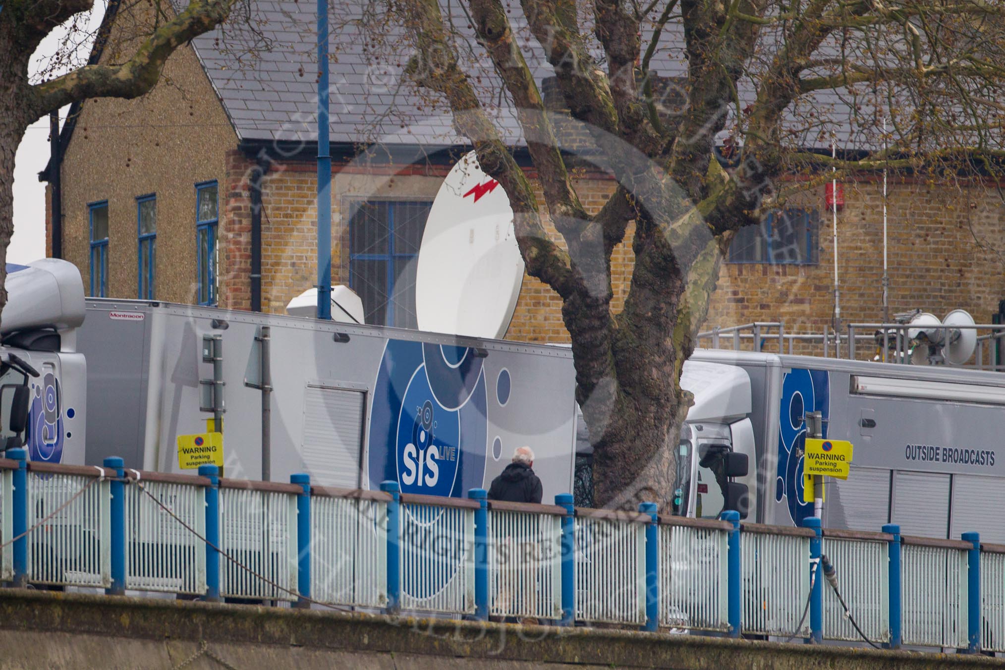 SIS LIVE trucks lining the Putney Embanment in preparation for the broadcast of the 2012 Boat Race by the BBC.