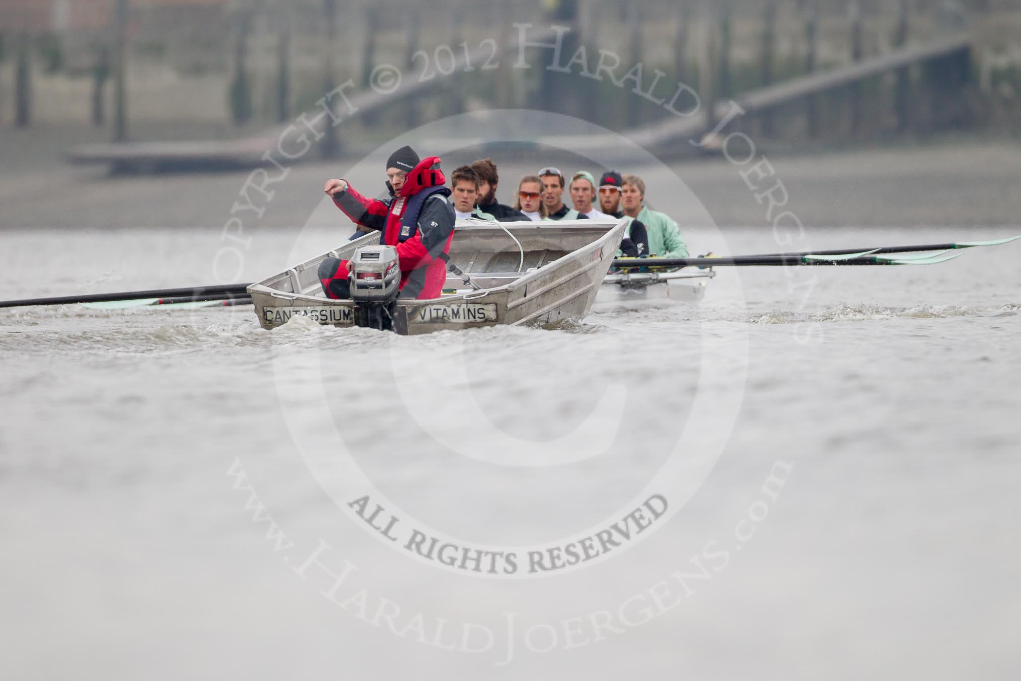 Cambridge University Boat Club chief coach Steve Trapmore and the CUBC Blue Boat during an outing on the River Thames, two days before the 2012 Boat Race.