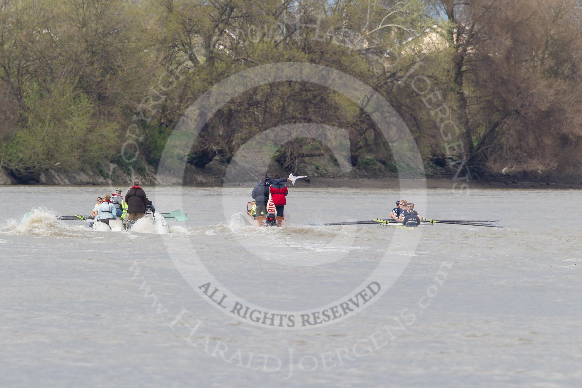 The Boat Race 2012: The Goldie/Isis Boat Race: Approaching the Mile Post, Goldie on the left, Isis on the right, behind in the middle umpire Richard Phelps..




on 07 April 2012 at 13:47, image #182