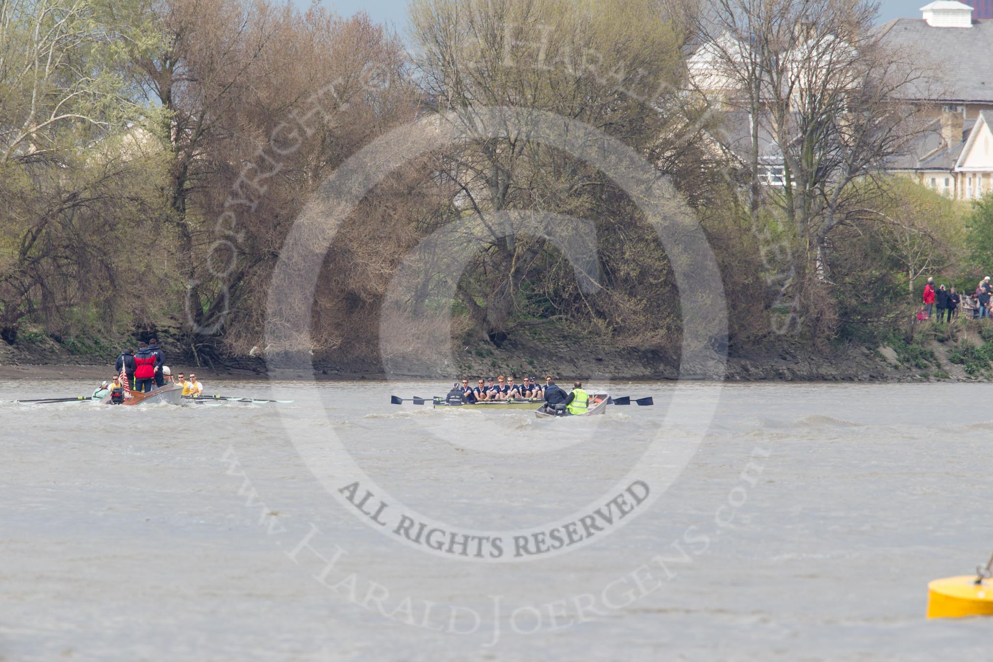 The Boat Race 2012: The Goldie/Isis Boat Race: Approaching the Mile Post, Goldie on the left, Isis on the right, behind in the middle umpire Richard Phelps..




on 07 April 2012 at 13:48, image #185