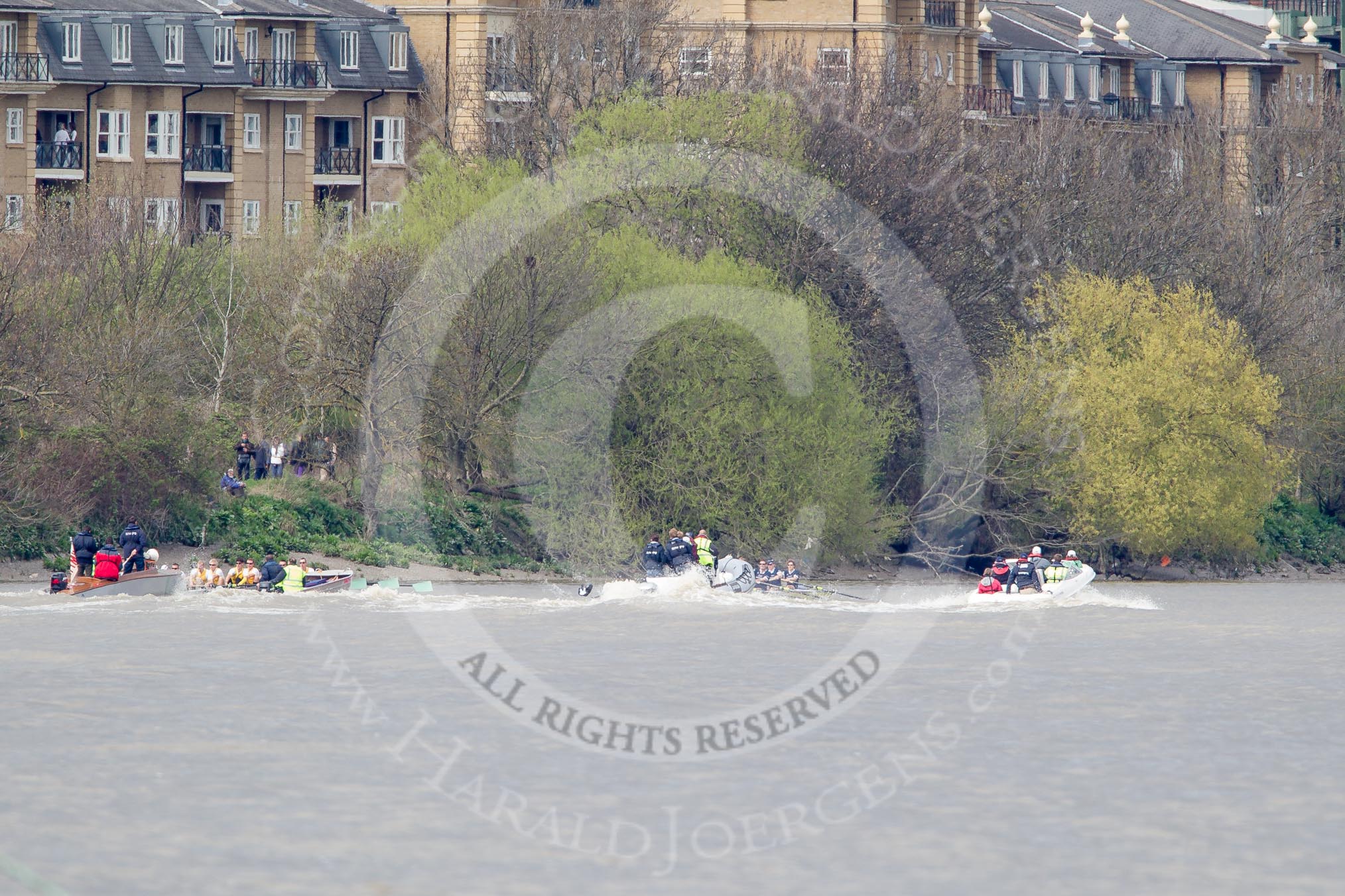 The Boat Race 2012: The Isis v Goldie Boat Race. The Oxford reserve boat Isis, on the right, in the lead, approaching Harrord Repository, behind Goldie race umpire John Garret..




on 07 April 2012 at 13:49, image #188