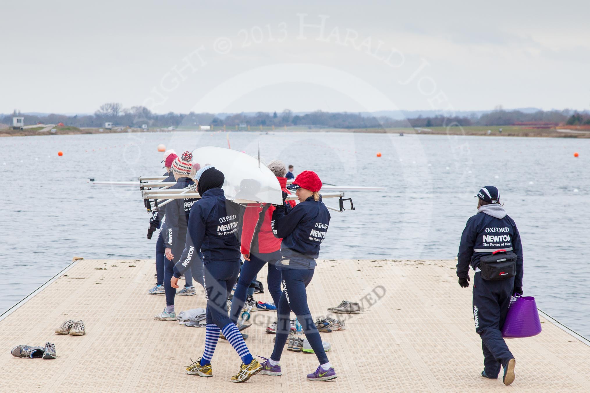 The Boat Race season 2013 - fixture OUWBC vs Molesey BC: The OUWBC Blue Boat carrying their boat towards Dorney Lake for a reaining session..
Dorney Lake,
Dorney, Windsor,
Berkshire,
United Kingdom,
on 24 February 2013 at 11:12, image #17