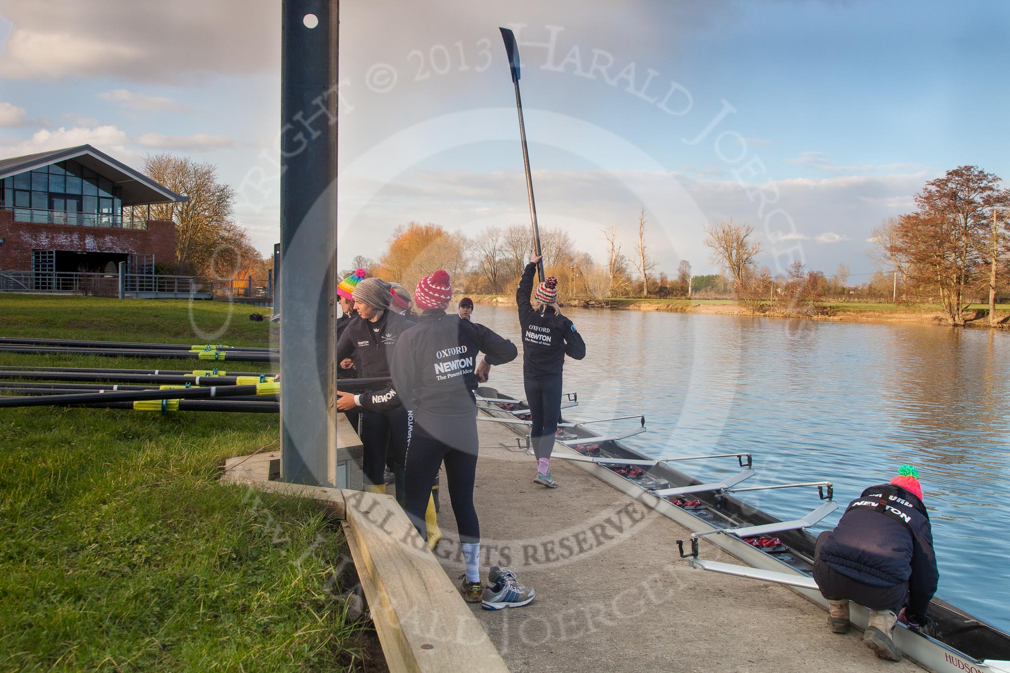 The Boat Race season 2013 - OUWBC training: The OUWBC Blue Boat squad getting ready at Fleming Boathouse - bow Mariann Novak, Alice Carrington-Windo, Mary Foord-Weston, Jo Lee, Amy Varney, Harriet Keane, Anastasia Chitty, stroke Maxie Scheske, and cox Katie Apfelbaum..
Fleming Boathouse,
Wallingford,
Oxfordshire,
United Kingdom,
on 13 March 2013 at 16:49, image #18