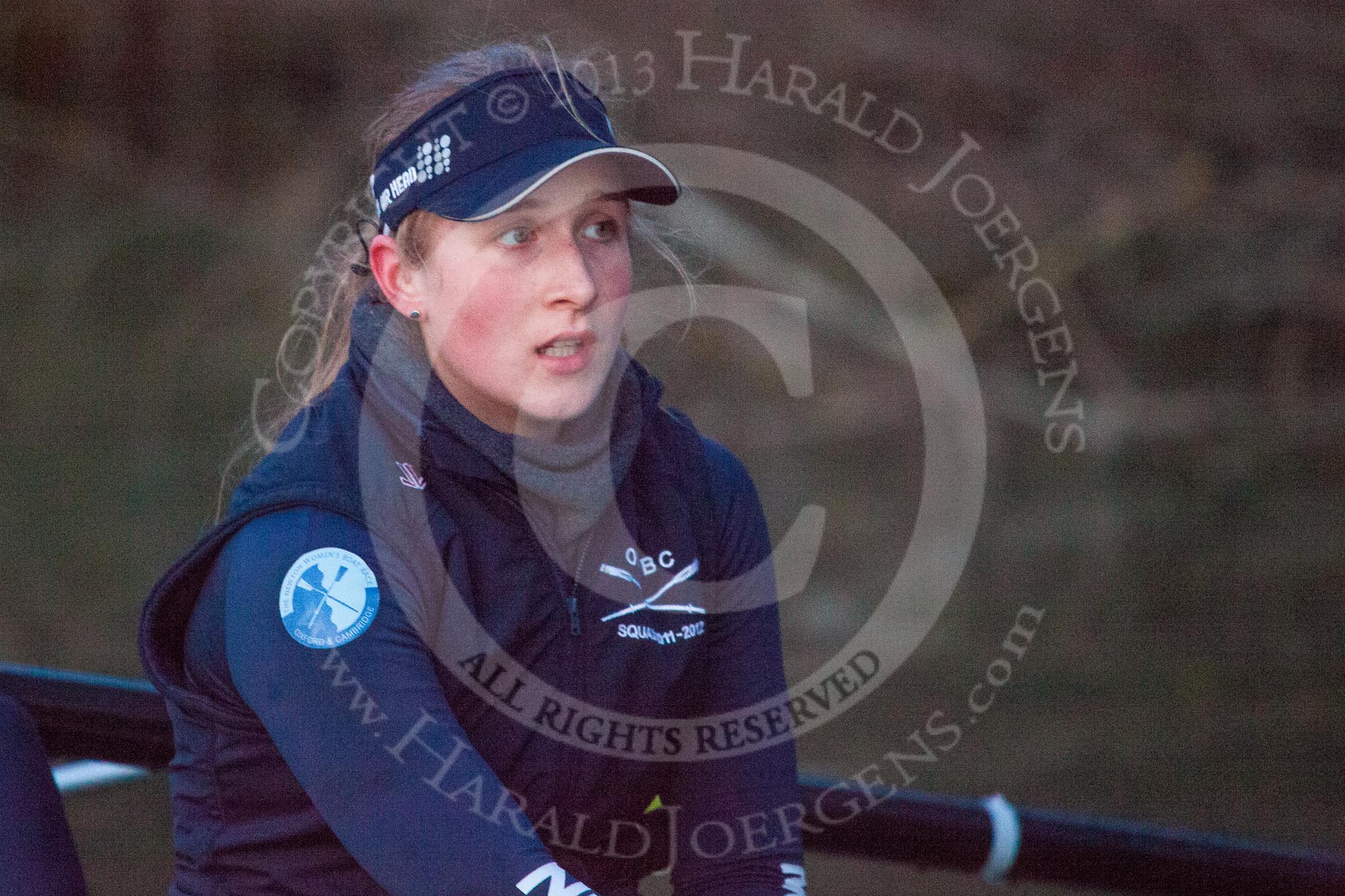 The Boat Race season 2013 - OUWBC training: In the last rays os sunshine, with the light rapidly fading, OUWBC Blue Boat 3 seat Mary Foord-Weston..
River Thames,
Wallingford,
Oxfordshire,
United Kingdom,
on 13 March 2013 at 18:12, image #231