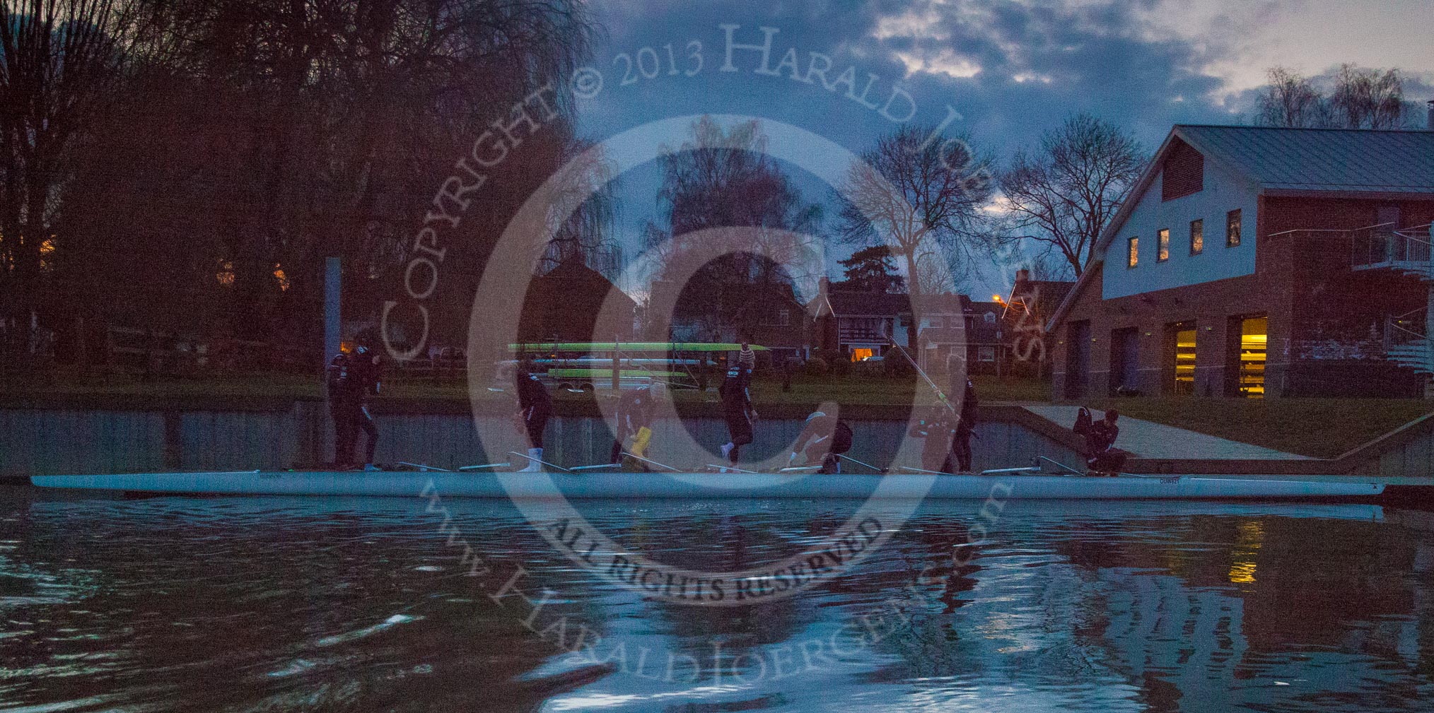 The Boat Race season 2013 - OUWBC training: The OUWBC Blue Boat returning to Fleming Boathouse, in last light, afther the training session..
River Thames,
Wallingford,
Oxfordshire,
United Kingdom,
on 13 March 2013 at 18:21, image #235