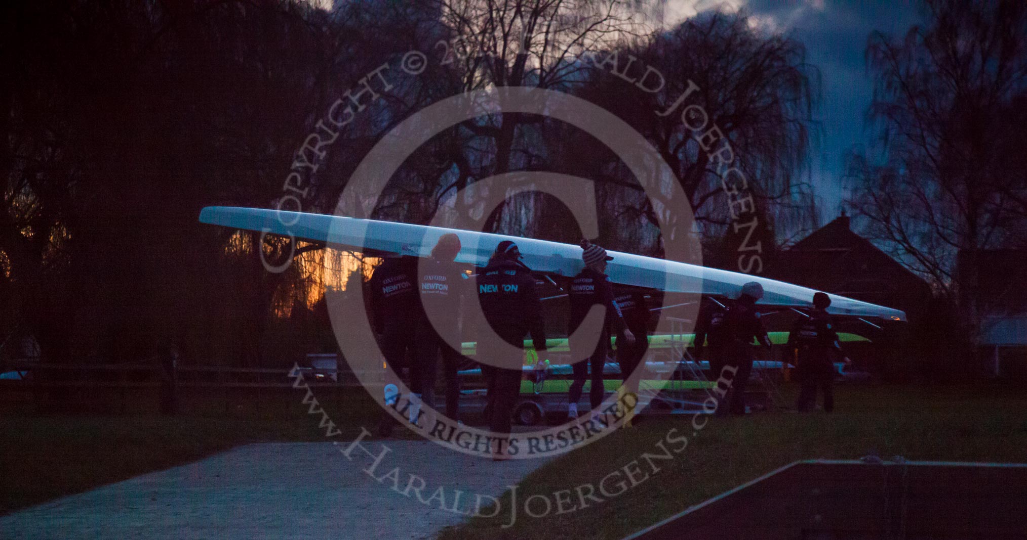 The Boat Race season 2013 - OUWBC training: The OUWBC Blue Boat crew back at Fleming Boathouse, in last light, afther the training session..
River Thames,
Wallingford,
Oxfordshire,
United Kingdom,
on 13 March 2013 at 18:23, image #237