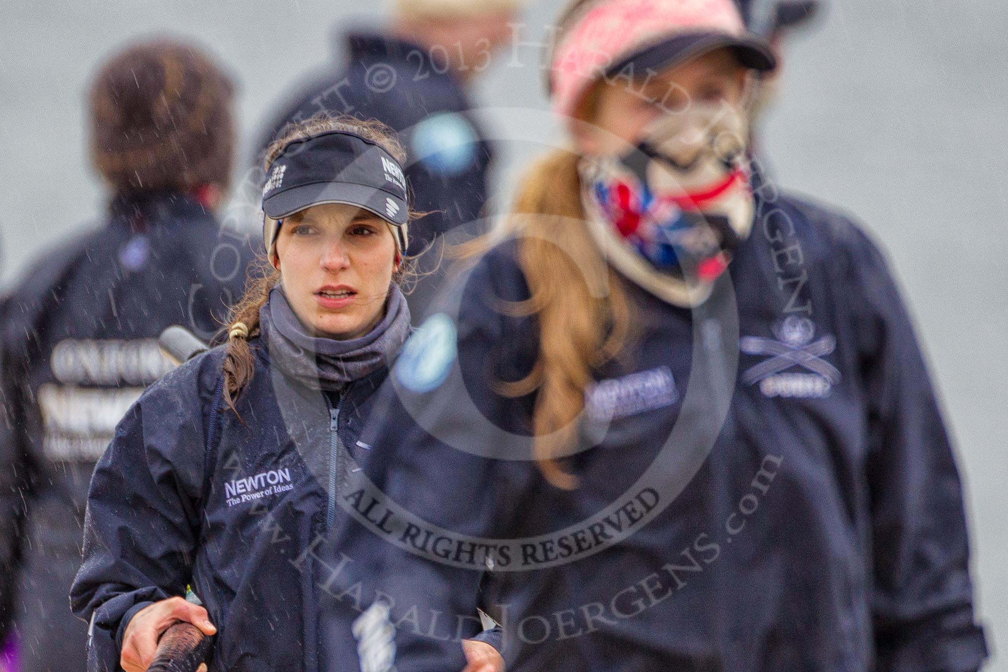 The Boat Race season 2013 - fixture OUWBC vs Olympians: Emily Chittock, stroke in the OUWBC reserve boat Osiris, and bow Coralie Viollet-Djelassi, here in focus, after a training session in pouring rain and freezing cold at Dorney Lake..
Dorney Lake,
Dorney, Windsor,
Buckinghamshire,
United Kingdom,
on 16 March 2013 at 09:58, image #3