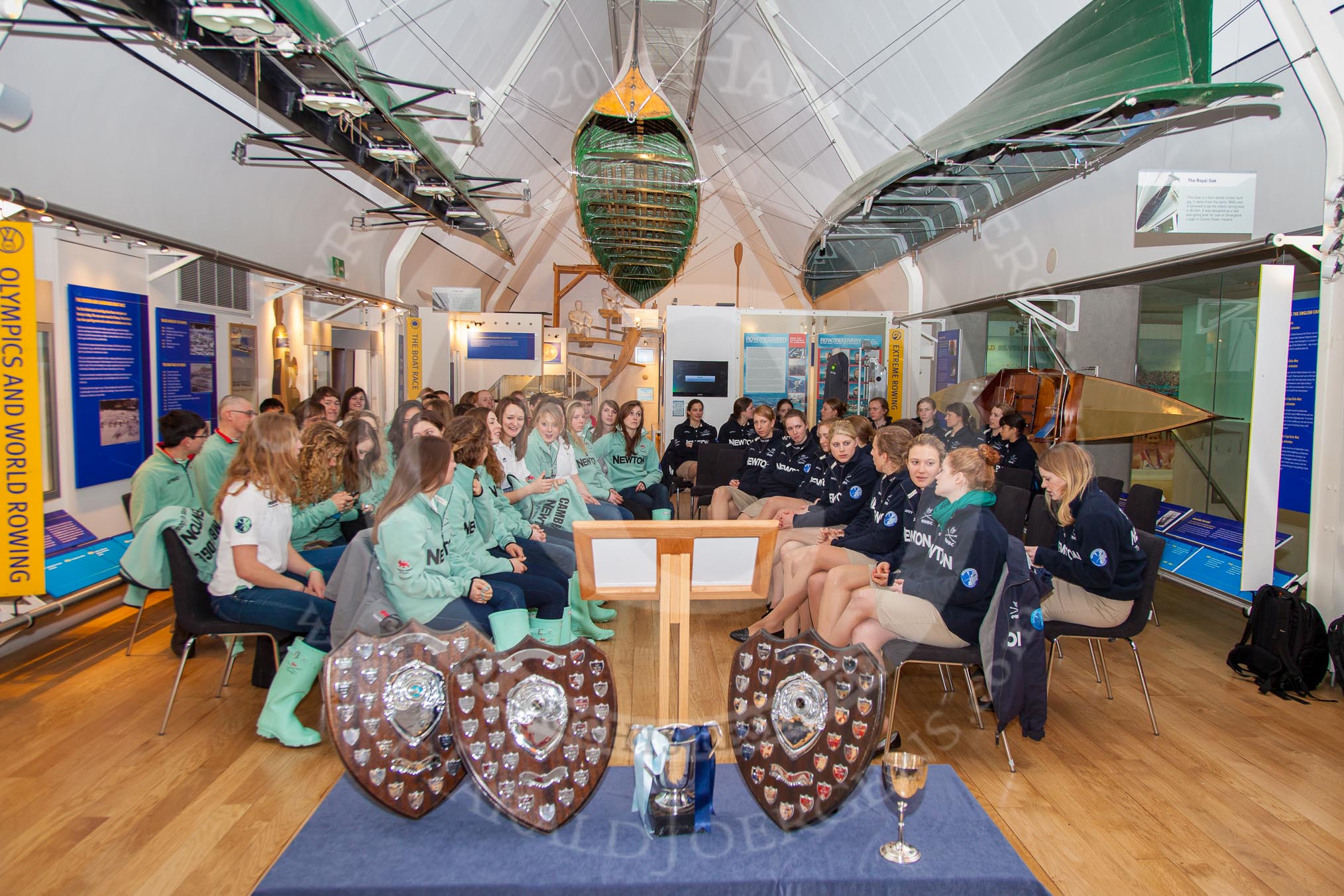 The Boat Race Season 2013 - Henley Boat Races Challenge: The Cambridge University crews on the left, Oxford University on the right, in front the Henley Boat Races trophies, at the Schwarzenbach International Gallery, Henley River and Rowing Museum..
River and Rowing Museum,
H,


on 19 March 2013 at 10:42, image #3