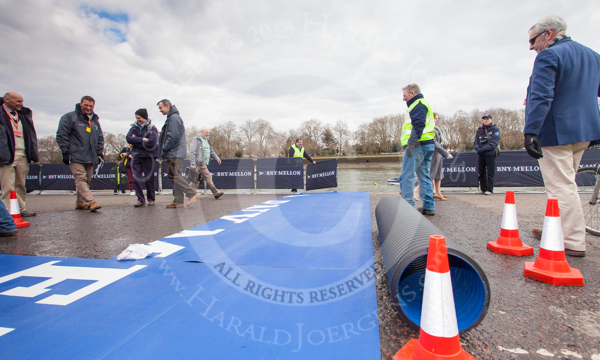 The Boat Race 2013: The dark blue "red carpet" rolled out for Oxford, hours before the start of the 2013 Boat Race. On the left the race umpires, Boris Rankov (Isis/Goldie race) and Sir Matthew Pinsent (Blue Boat Race)..
Putney,
London SW15,

United Kingdom,
on 31 March 2013 at 12:47, image #51