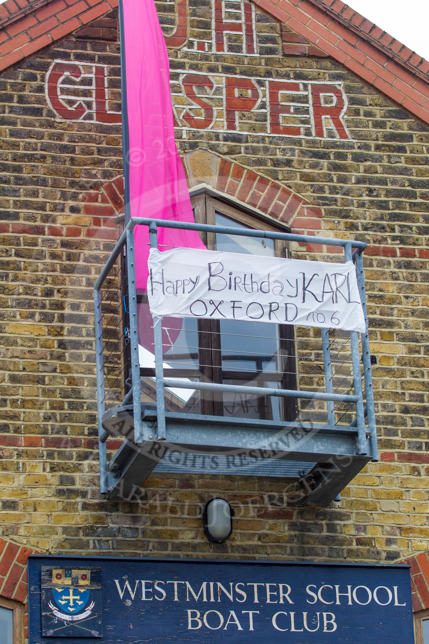 The Boat Race 2013: Westminster School Boat Club at Putney Embankment, the "home" of te Oxford team during Tideway Week, with birthday wishes for the Oxford No. 6, Karl Hudspith, 2013 Boat Race day being his 25th birthday..
Putney,
London SW15,

United Kingdom,
on 31 March 2013 at 12:51, image #54