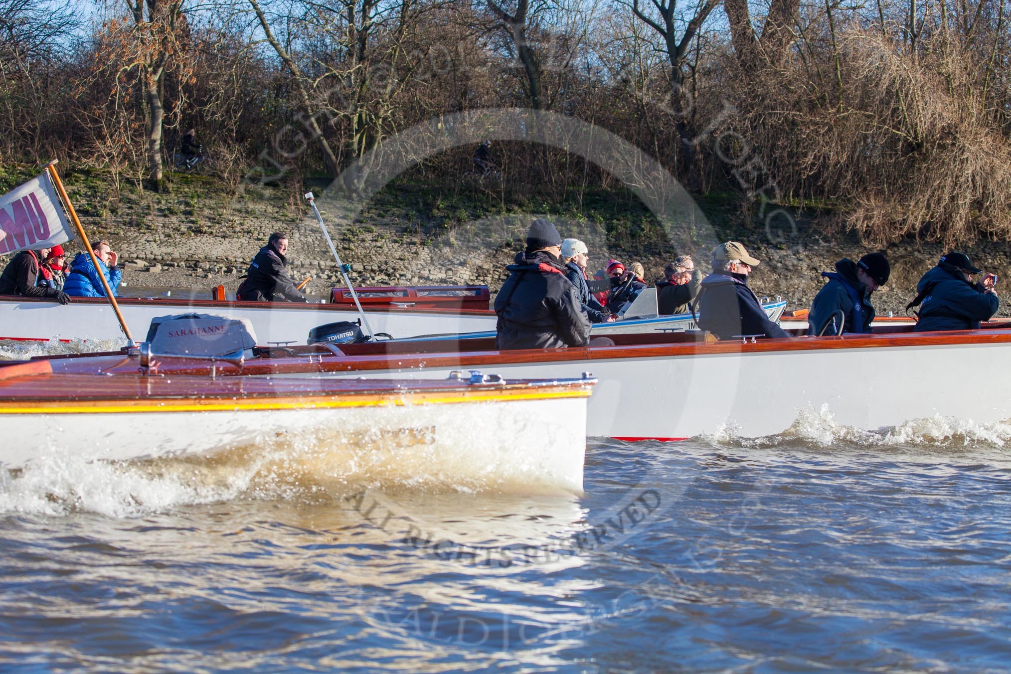 The Boat Race season 2014 - Women's Trial VIIIs (OUWBC, Oxford): The flotilla of boats following the race..
River Thames between Putney Bridge and Mortlake,
London SW15,

United Kingdom,
on 19 December 2013 at 12:57, image #179