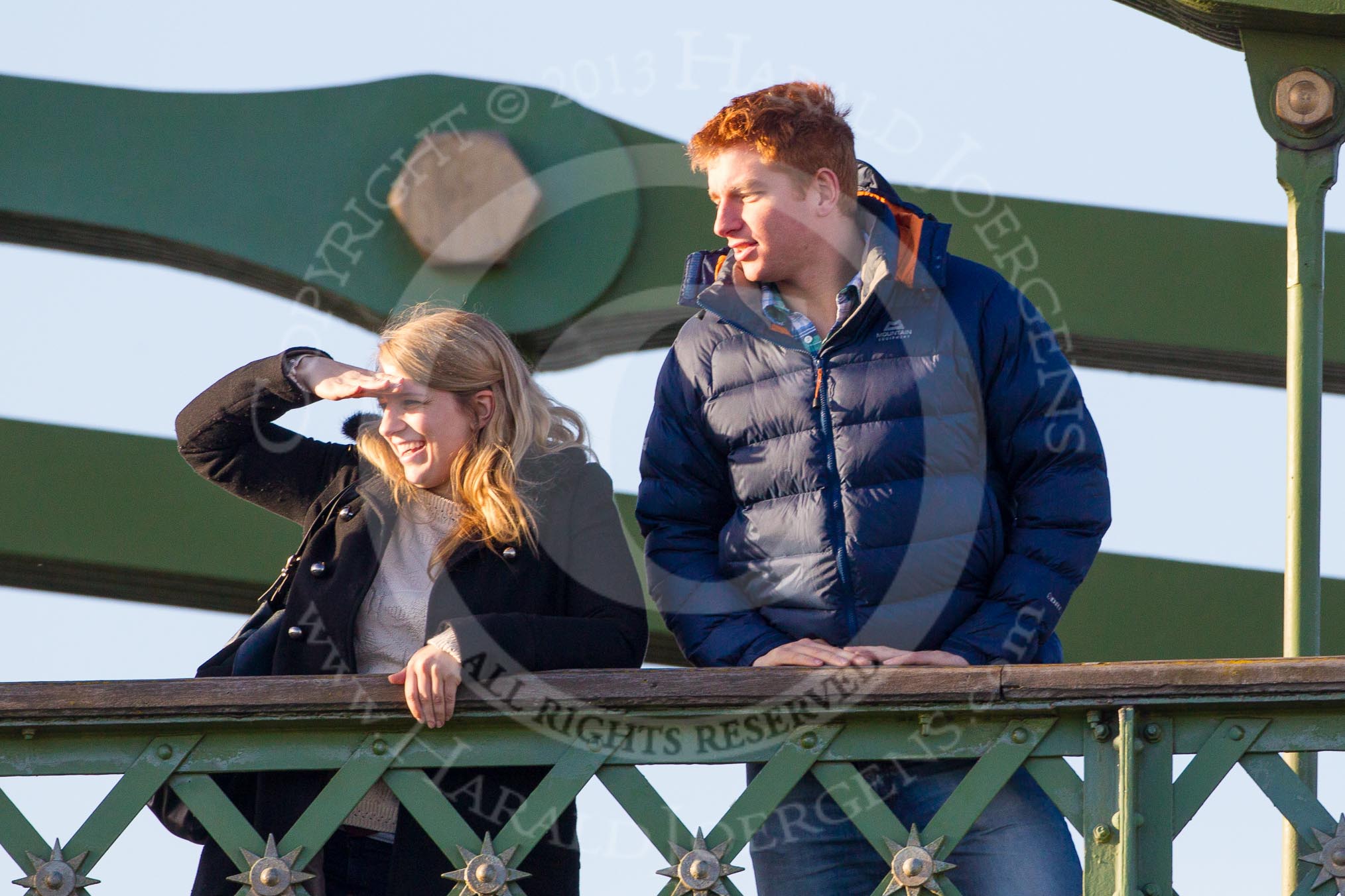 The Boat Race season 2014 - Women's Trial VIIIs(CUWBC, Cambridge): Onlookers watching the race from Hammersmith Bridge..
River Thames between Putney Bridge and Mortlake,
London SW15,

United Kingdom,
on 19 December 2013 at 14:10, image #405