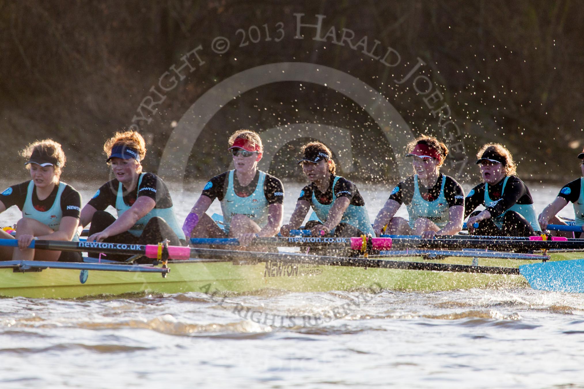 The Boat Race season 2014 - Women's Trial VIIIs(CUWBC, Cambridge): Nudge Nudge: Stroke Holly Game,7 Izzy Vyvyan, 6 Kate Ashley, 5 Valentina Futoryanova, 4 Catherine Foot, 3 Hannah Evans, 2 Anouska Bartlett..
River Thames between Putney Bridge and Mortlake,
London SW15,

United Kingdom,
on 19 December 2013 at 14:14, image #445