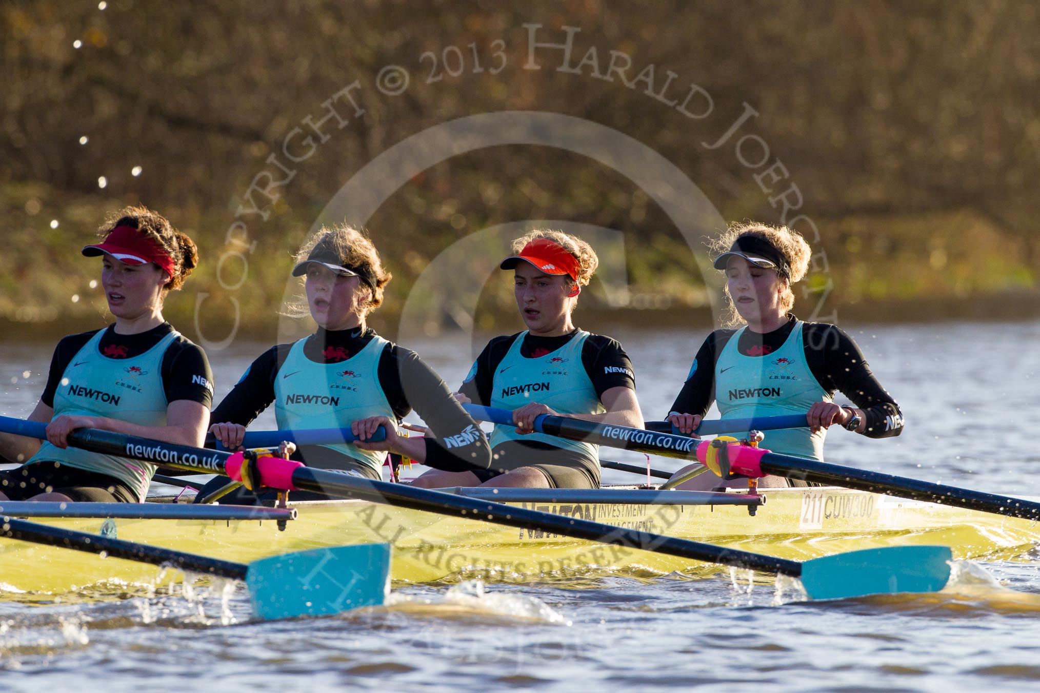 The Boat Race season 2014 - Women's Trial VIIIs(CUWBC, Cambridge): Nudge Nudge:  4 Catherine Foot, 3 Hannah Evans, 2 Anouska Bartlett, Bow Lottie Meggitt..
River Thames between Putney Bridge and Mortlake,
London SW15,

United Kingdom,
on 19 December 2013 at 14:15, image #448