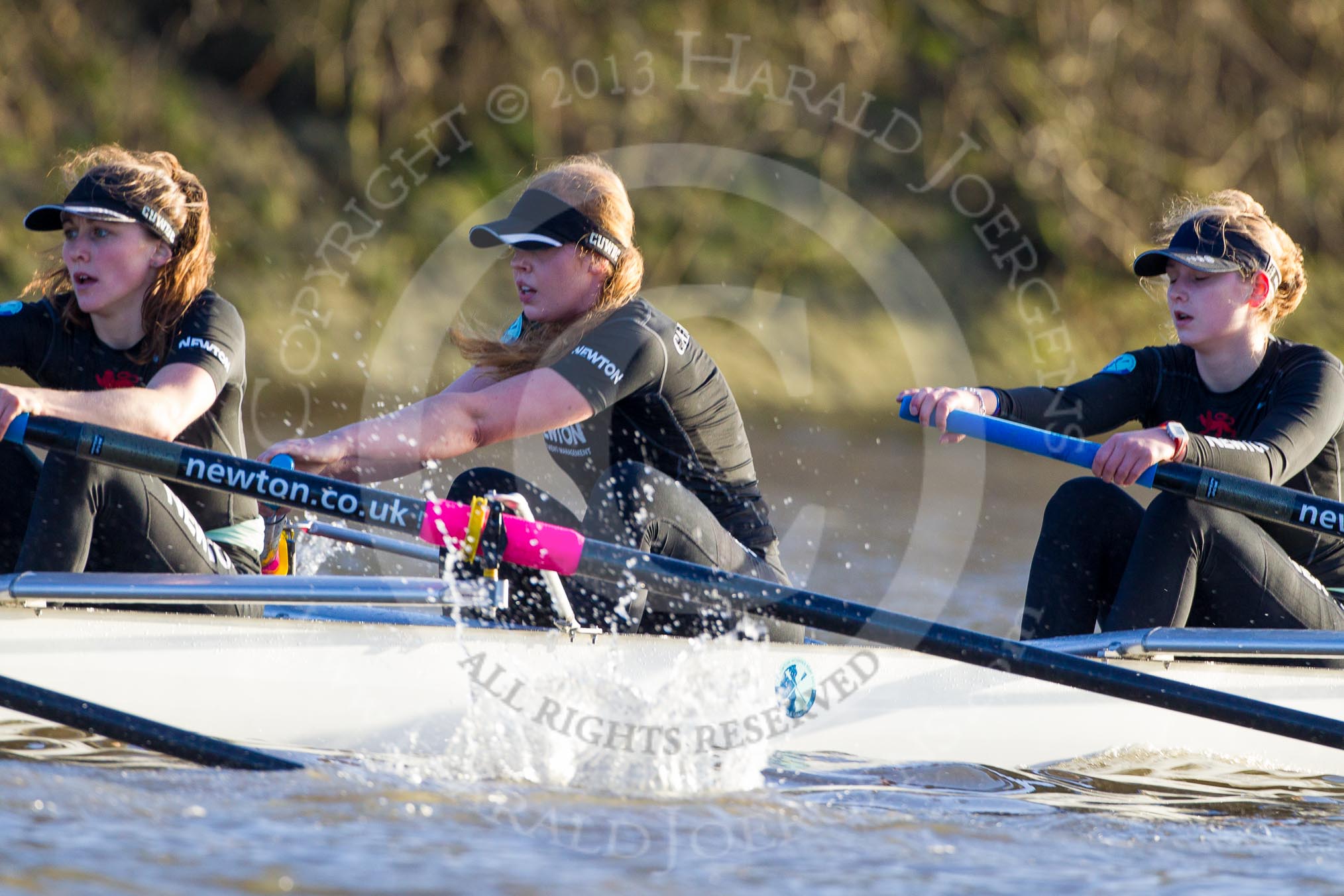 The Boat Race season 2014 - Women's Trial VIIIs(CUWBC, Cambridge): Wink Wink:  5 Caroline Reid, 4 Sara Lackner, 3 Hannah Roberts, 2 Sarah Crowther, Bow Ella Barnard..
River Thames between Putney Bridge and Mortlake,
London SW15,

United Kingdom,
on 19 December 2013 at 14:15, image #454