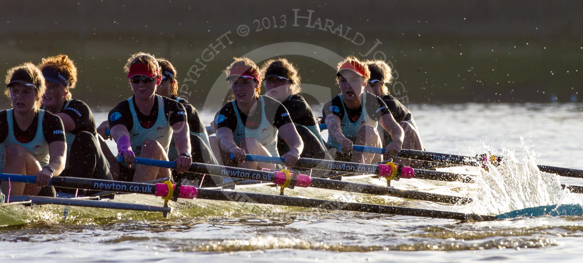 The Boat Race season 2014 - Women's Trial VIIIs(CUWBC, Cambridge): Nudge Nudge:  Stroke Holly Game,7 Izzy Vyvyan, 6 Kate Ashley, 5 Valentina Futoryanova, 4 Catherine Foot, 3 Hannah Evans, 2 Anouska Bartlett, Bow Lottie Meggitt..
River Thames between Putney Bridge and Mortlake,
London SW15,

United Kingdom,
on 19 December 2013 at 14:18, image #480