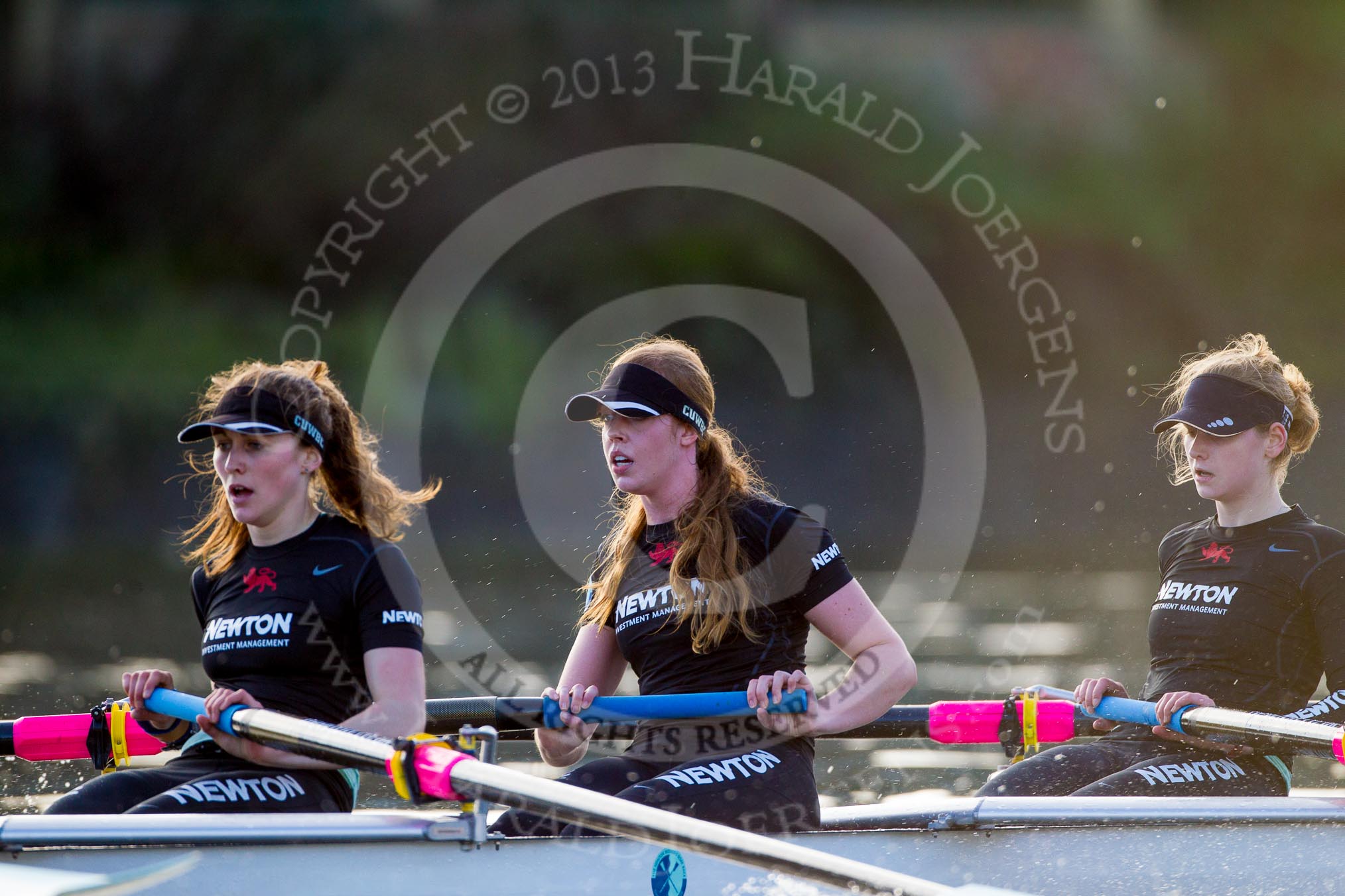 The Boat Race season 2014 - Women's Trial VIIIs(CUWBC, Cambridge): Wink Wink:  5 Caroline Reid, 4 Sara Lackner, 3 Hannah Roberts..
River Thames between Putney Bridge and Mortlake,
London SW15,

United Kingdom,
on 19 December 2013 at 14:21, image #513