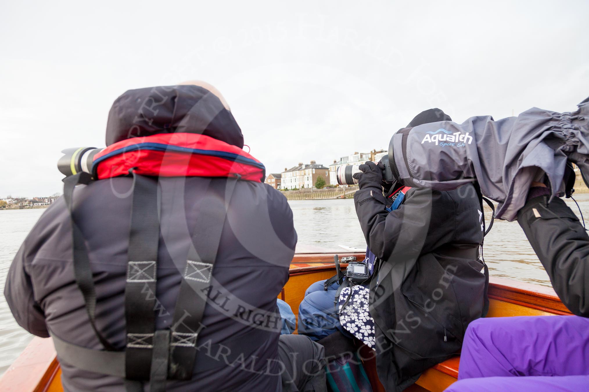 The Boat Race season 2016 - Women's Boat Race Trial Eights (OUWBC, Oxford): Photographers in the press launch following the two Oxford boats.
River Thames between Putney Bridge and Mortlake,
London SW15,

United Kingdom,
on 10 December 2015 at 12:27, image #224