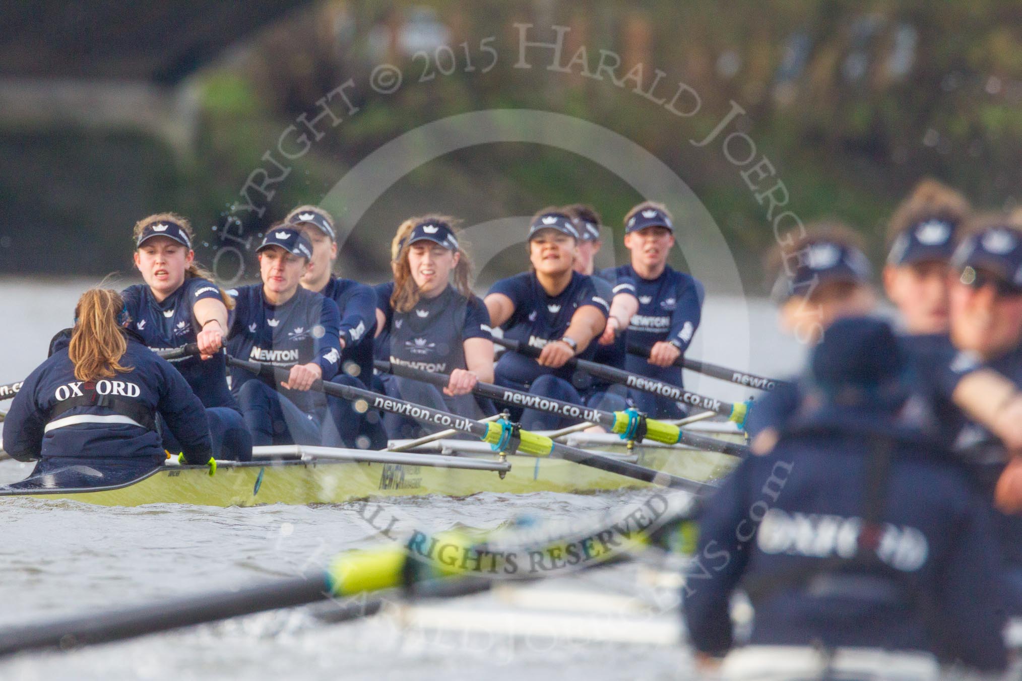 The Boat Race season 2016 - Women's Boat Race Trial Eights (OUWBC, Oxford): "Charybdis", cox-Morgan Baynham-Williams, stroke-Kate Erickson, 7-Maddy Badcott, 6-Elo Luik, 5-Ruth Siddorn, 4-Emma Spruce, 3-Lara Pysden, 2-Christina Fleischer, bow-Georgie Daniell  
 seen behind "Scylla".
River Thames between Putney Bridge and Mortlake,
London SW15,

United Kingdom,
on 10 December 2015 at 12:37, image #334