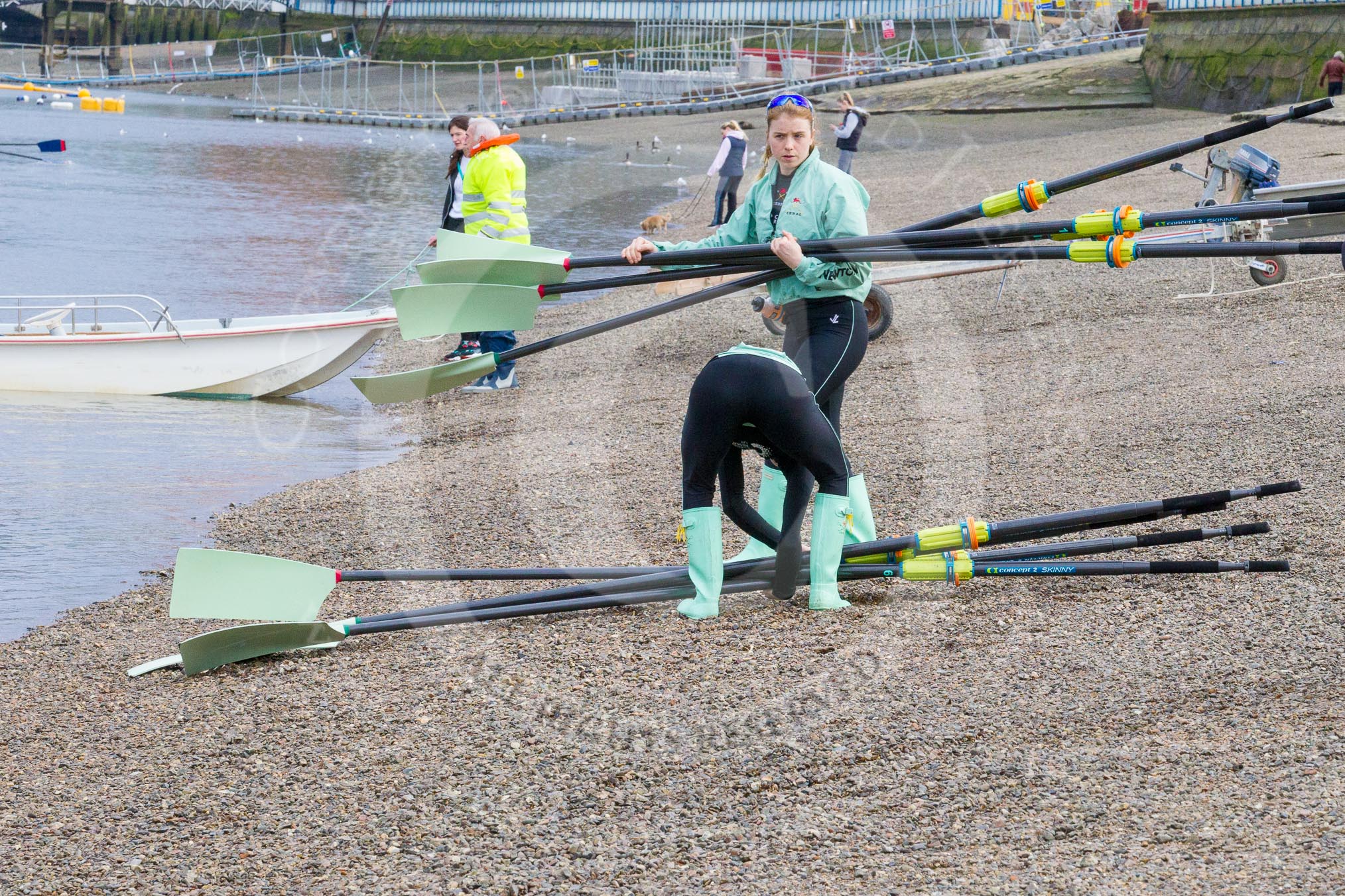 The Boat Race season 2017 - Women's Boat Race Fixture CUWBC vs Univerity of London: CUWBC's 4, Imogen Grant, and stroke Alice White carrying oars from the boat house.
River Thames between Putney Bridge and Mortlake,
London SW15,

United Kingdom,
on 19 February 2017 at 15:13, image #3