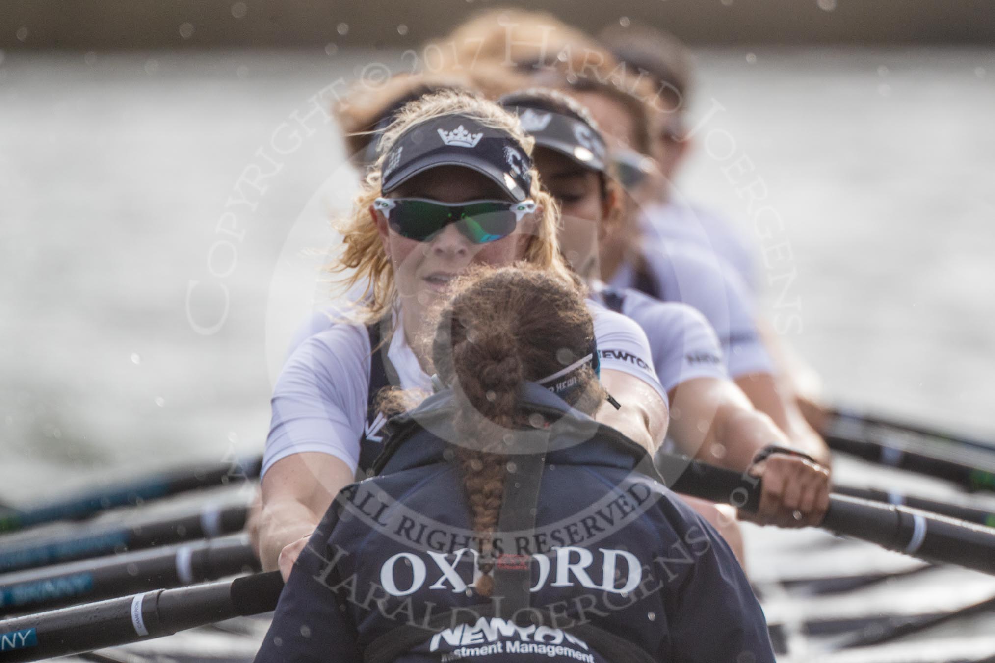 The Cancer Research UK Boat Race season 2017 - Women's Boat Race Fixture OUWBC vs Molesey BC: The OUWBC boat seen from behind - bow Alice Roberts, 2 Beth Bridgman, 3 Rebecca Te Water Naude, 4 Rebecca Esselstein, 5 Chloe Laverack, 6 Harriet Austin, 7 Jenna Hebert, stroke Emily Cameron, cox Eleanor Shearer.
River Thames between Putney Bridge and Mortlake,
London SW15,

United Kingdom,
on 19 March 2017 at 16:22, image #142