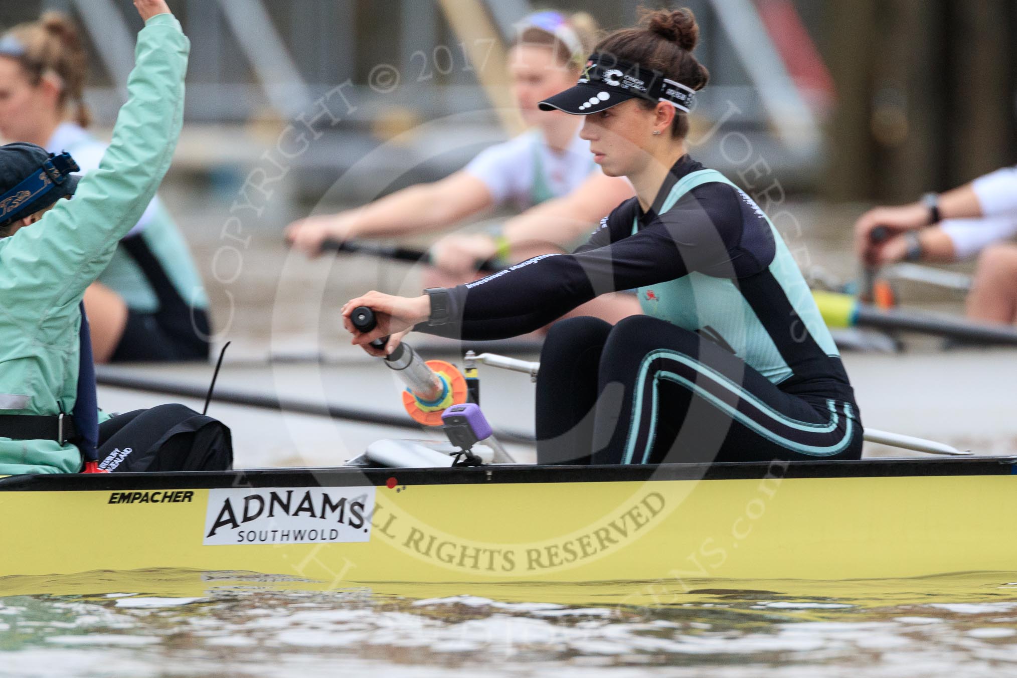 The Boat Race season 2018 - Women's Boat Race Trial Eights (CUWBC, Cambridge): Wingardium Leviosa just before the start of the race, here cox-Sophie Wrixon, stroke-Imogen Grant, with Expecto Patronum in the background.
River Thames between Putney Bridge and Mortlake,
London SW15,

United Kingdom,
on 05 December 2017 at 12:43, image #50