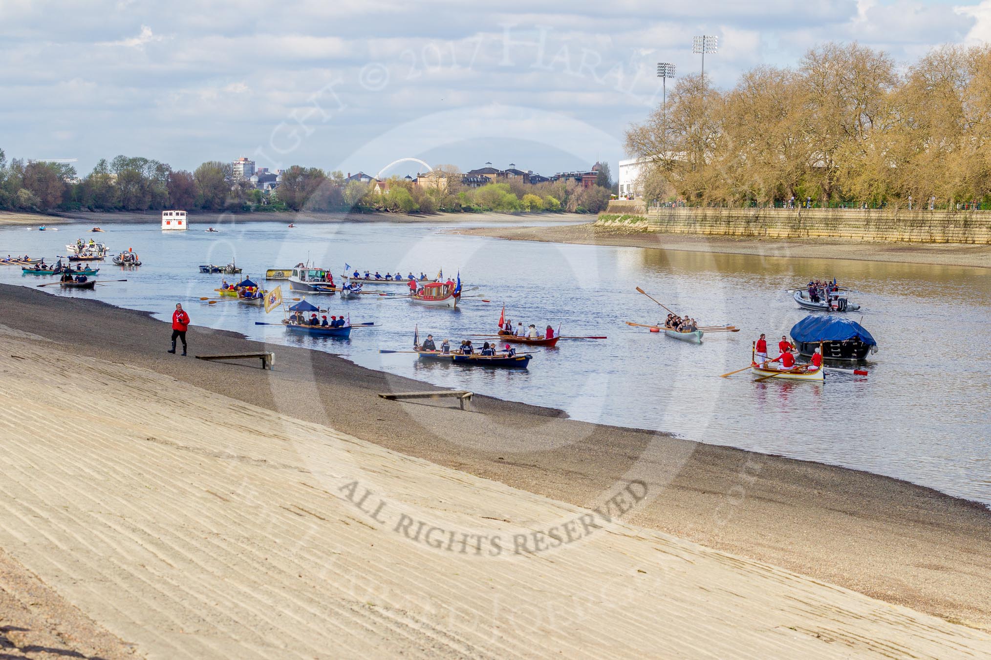 The Boat Race season 2017 -  The Cancer Research Women's Boat Race: A flotilla of historic boats on the Thames, keeping the crowds entertained.
River Thames between Putney Bridge and Mortlake,
London SW15,

United Kingdom,
on 02 April 2017 at 14:02, image #12