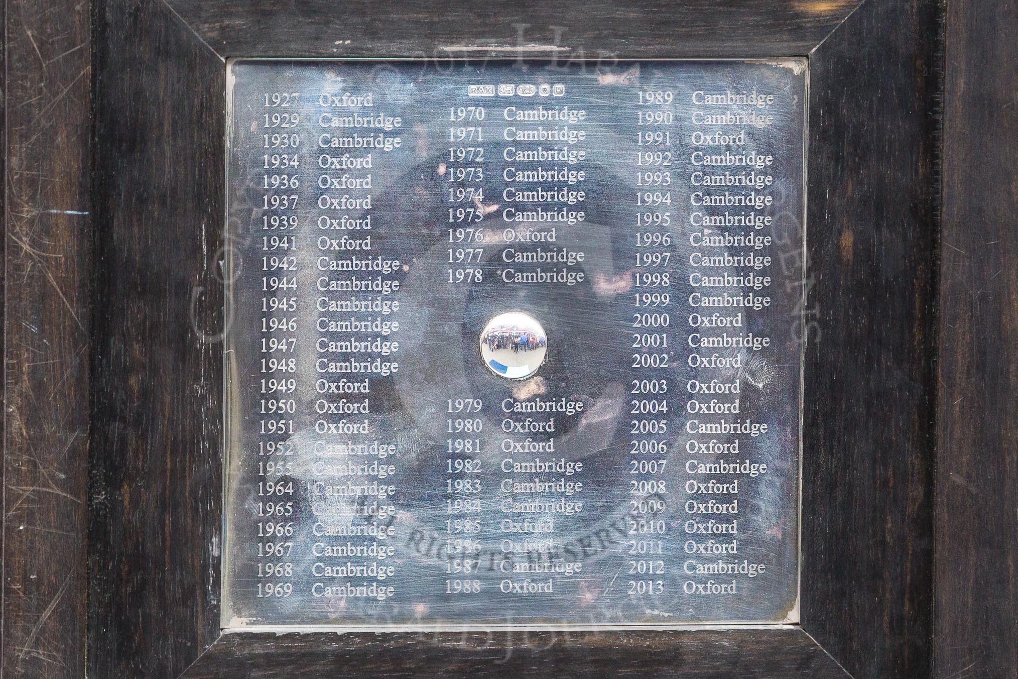 The Boat Race season 2017 -  The Cancer Research Women's Boat Race: The bottom of the Boat Race trophy, showing the winners from 1927 to 2013.
River Thames between Putney Bridge and Mortlake,
London SW15,

United Kingdom,
on 02 April 2017 at 14:35, image #16