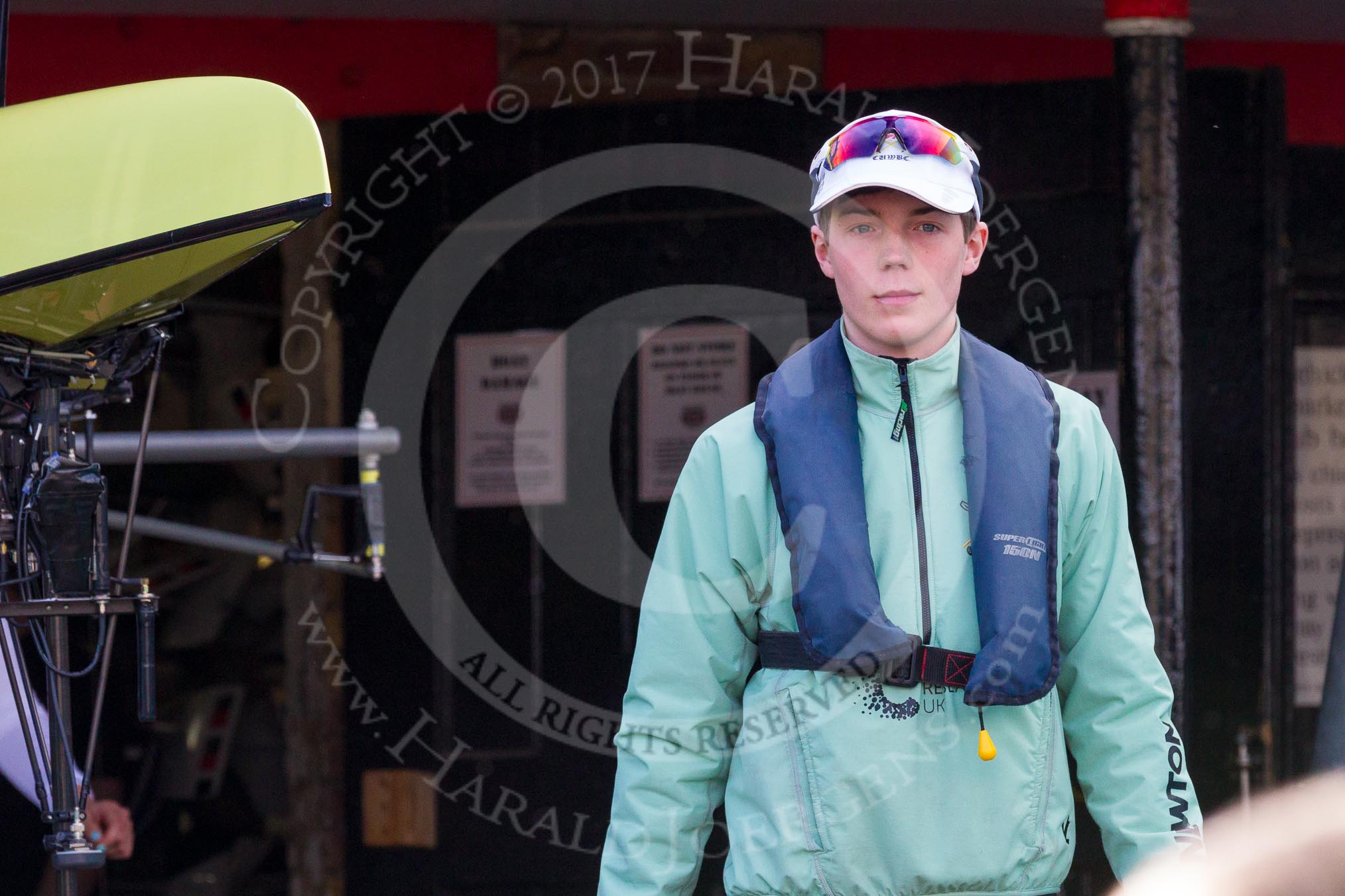 The Boat Race season 2017 -  The Cancer Research Women's Boat Race: CUWBC cox Matthew Holland leading the Cambridge crew on the way from the boat house to the river.
River Thames between Putney Bridge and Mortlake,
London SW15,

United Kingdom,
on 02 April 2017 at 15:47, image #48