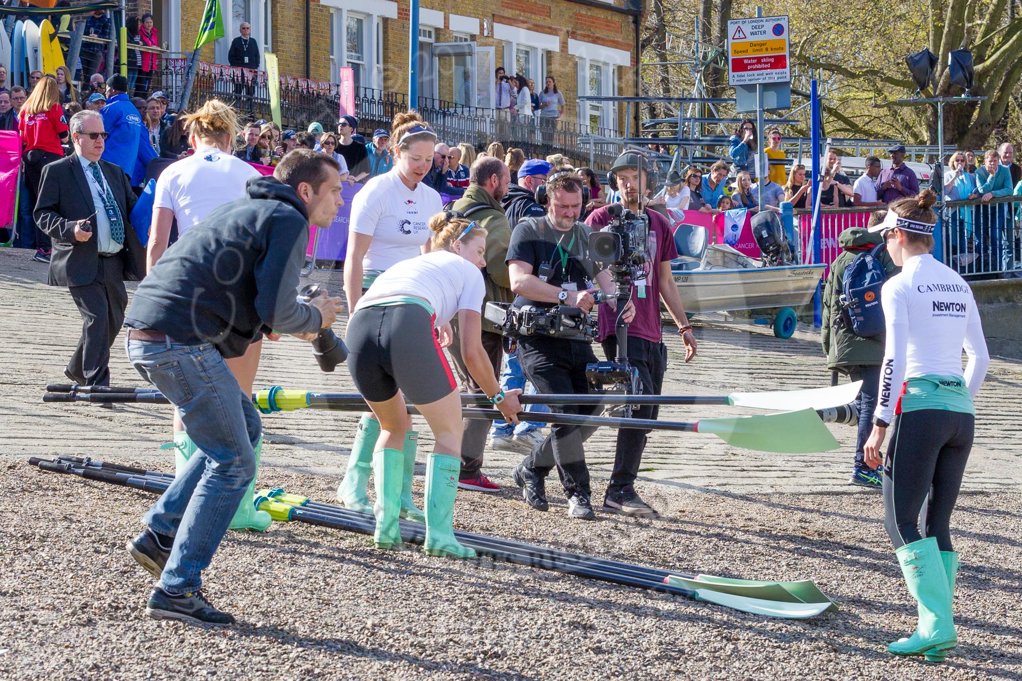 The Boat Race season 2017 -  The Cancer Research Women's Boat Race: CUWBC collectiong the oars to get ready for the Women's Boat Race.
River Thames between Putney Bridge and Mortlake,
London SW15,

United Kingdom,
on 02 April 2017 at 15:48, image #62