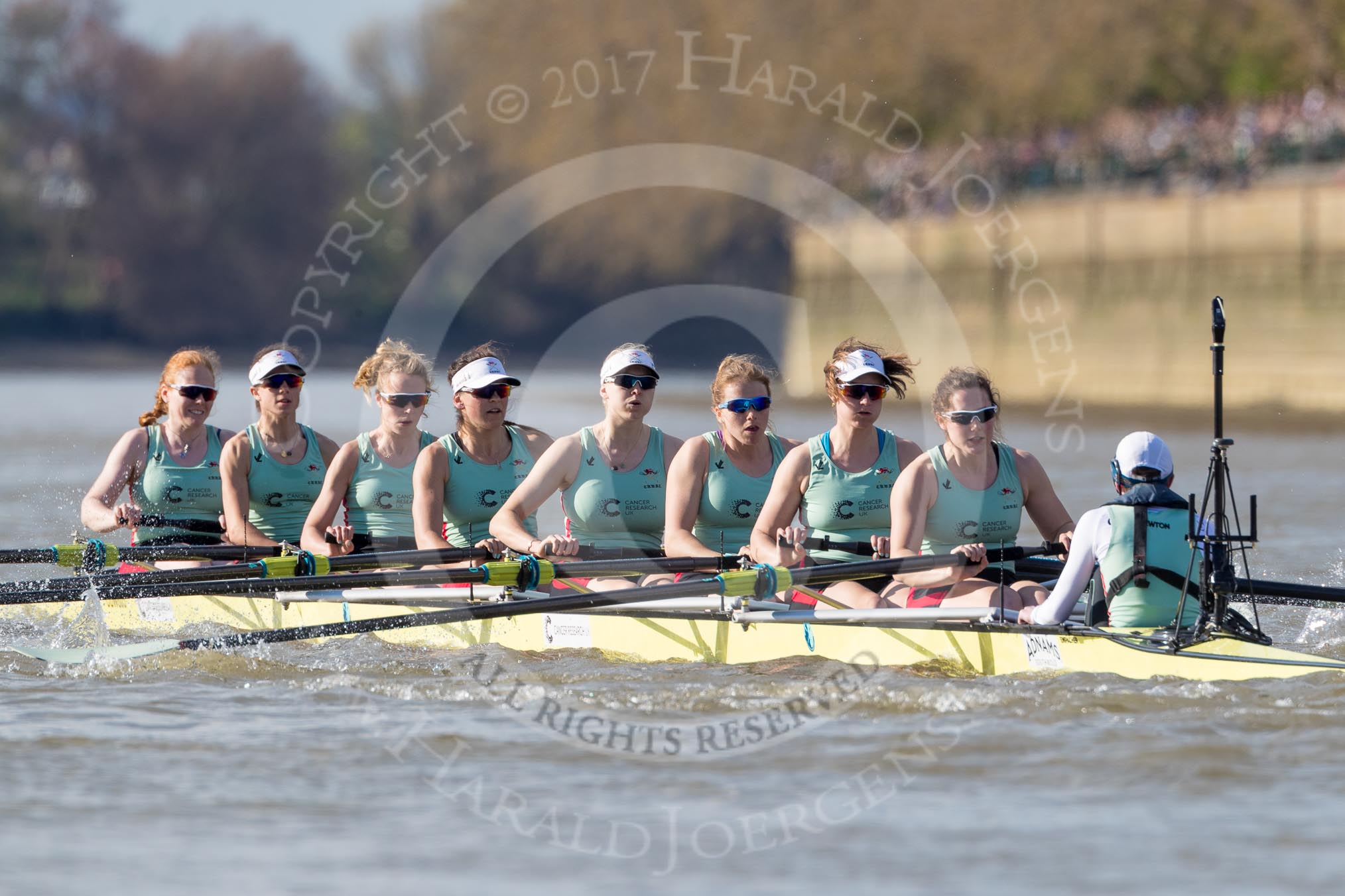 The Boat Race season 2017 -  The Cancer Research Women's Boat Race: The CUWBC Blue Boat at the start of the Women's Boat Race - bow Ashton Brown, 2 Imogen Grant, 3 Claire Lambe, 4 Anna Dawson, 5 Holly Hill, 6 Alice White, 7 Myriam Goudet, stroke Melissa Wilson, cox Matthew Holland.
River Thames between Putney Bridge and Mortlake,
London SW15,

United Kingdom,
on 02 April 2017 at 16:35, image #123