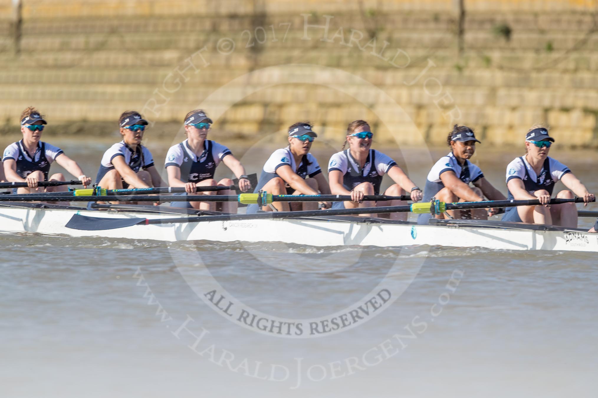 The Boat Race season 2017 -  The Cancer Research Women's Boat Race: OUWBC working hard to catch up with Cambridge, here 2 Flo Pickles, 3 Rebecca Te Water Naudé, 4 Rebecca Esselstein, 5 Chloe Laverack, 6 Harriet Austin, 7 Jenna Hebert, stroke Emily Cameron.
River Thames between Putney Bridge and Mortlake,
London SW15,

United Kingdom,
on 02 April 2017 at 16:36, image #131