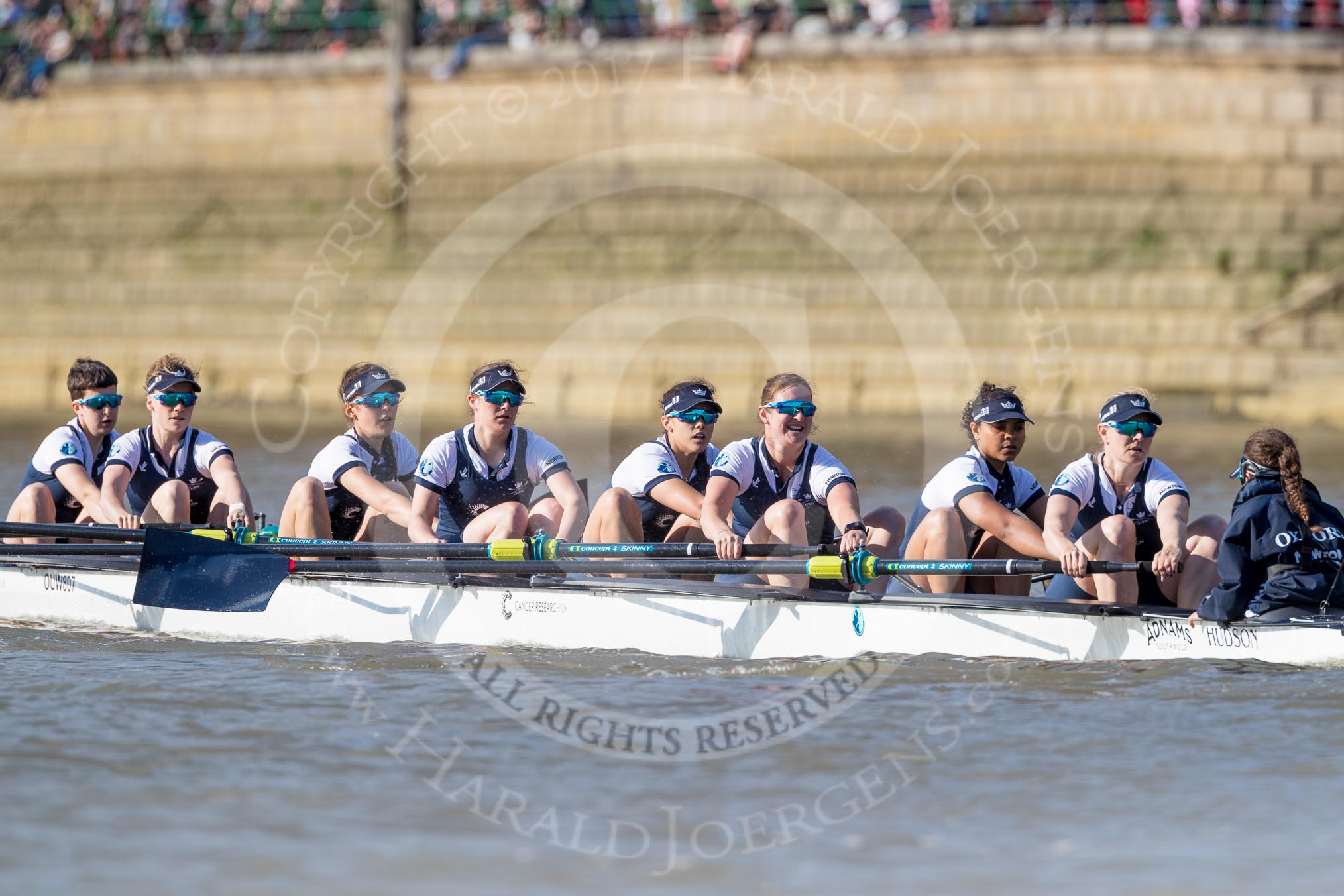 The Boat Race season 2017 -  The Cancer Research Women's Boat Race: OUWBC working hard to catch up with Cambridge, here bow Alice Roberts, 2 Flo Pickles, 3 Rebecca Te Water Naudé, 4 Rebecca Esselstein, 5 Chloe Laverack, 6 Harriet Austin, 7 Jenna Hebert, stroke Emily Cameron, cox Eleanor Shearer.
River Thames between Putney Bridge and Mortlake,
London SW15,

United Kingdom,
on 02 April 2017 at 16:36, image #133