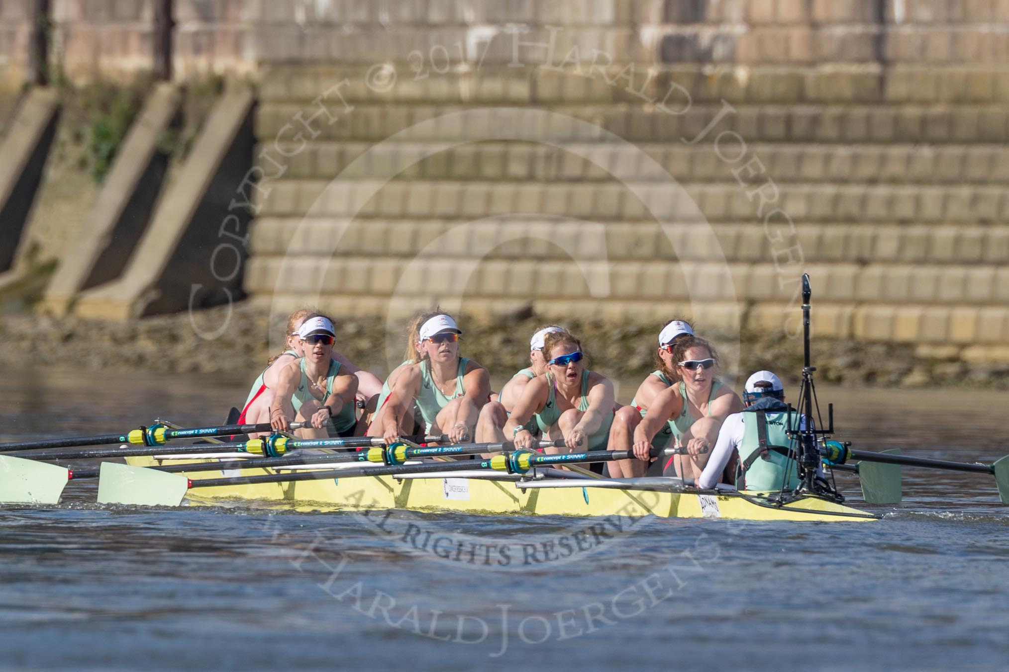 The Boat Race season 2017 -  The Cancer Research Women's Boat Race: Cambridge is keeping their comfortable lead at Fulham Reach - bow Ashton Brown, 2 Imogen Grant, 3 Claire Lambe, 4 Anna Dawson, 5 Holly Hill, 6 Alice White, 7 Myriam Goudet, stroke Melissa Wilson, cox Matthew Holland.
River Thames between Putney Bridge and Mortlake,
London SW15,

United Kingdom,
on 02 April 2017 at 16:41, image #150