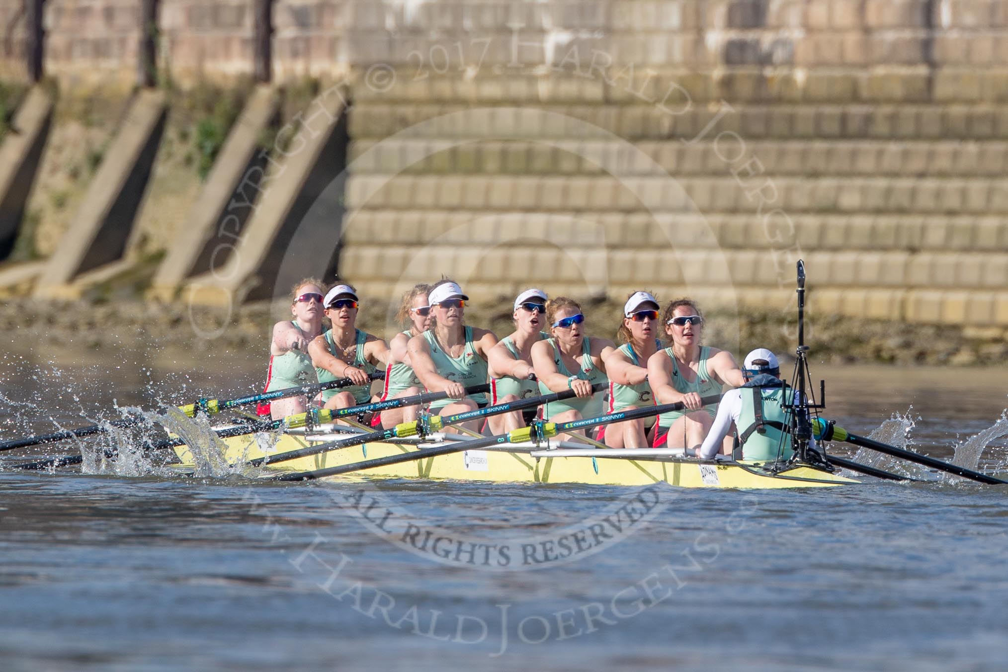 The Boat Race season 2017 -  The Cancer Research Women's Boat Race: Cambridge is keeping their comfortable lead at Fulham Reach - bow Ashton Brown, 2 Imogen Grant, 3 Claire Lambe, 4 Anna Dawson, 5 Holly Hill, 6 Alice White, 7 Myriam Goudet, stroke Melissa Wilson, cox Matthew Holland.
River Thames between Putney Bridge and Mortlake,
London SW15,

United Kingdom,
on 02 April 2017 at 16:41, image #151